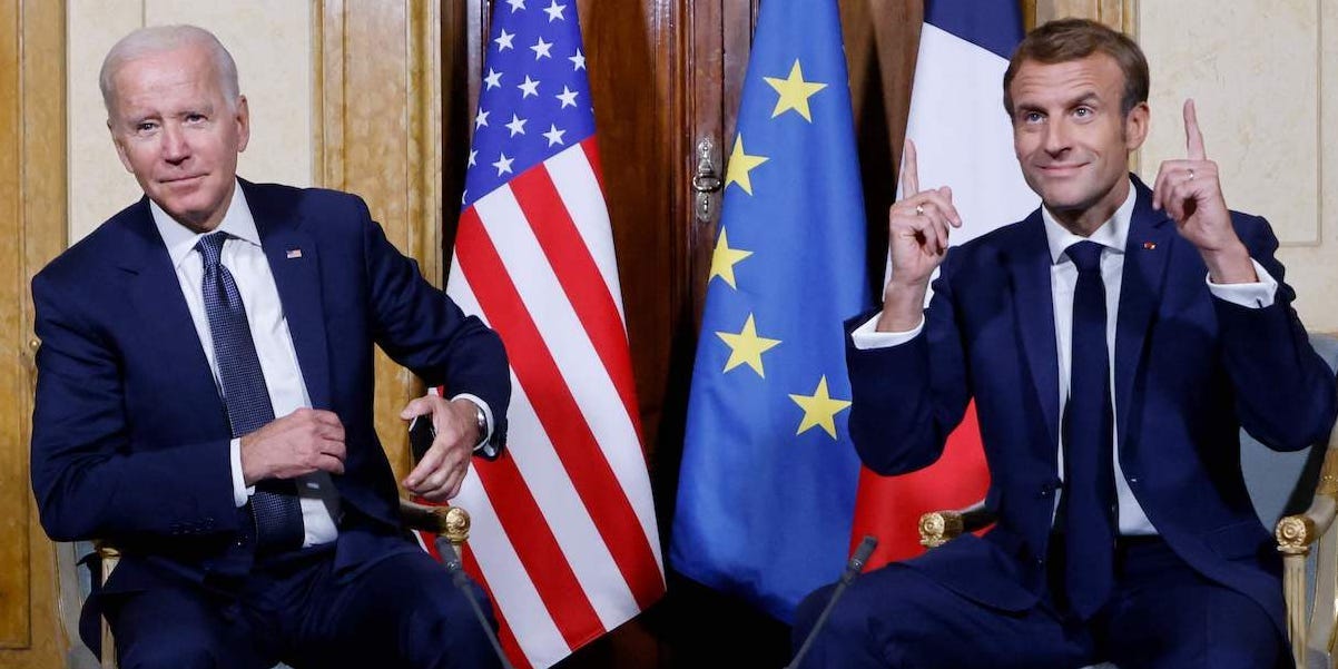 French President Emmanuel Macron (R) and US President Joe Biden (L) meet at the French Embassy to the Vatican in Rome on October 29, 2021.