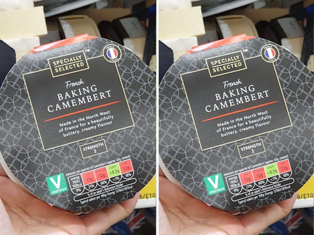 hand holding Aldi's baking camembrat in black packaging