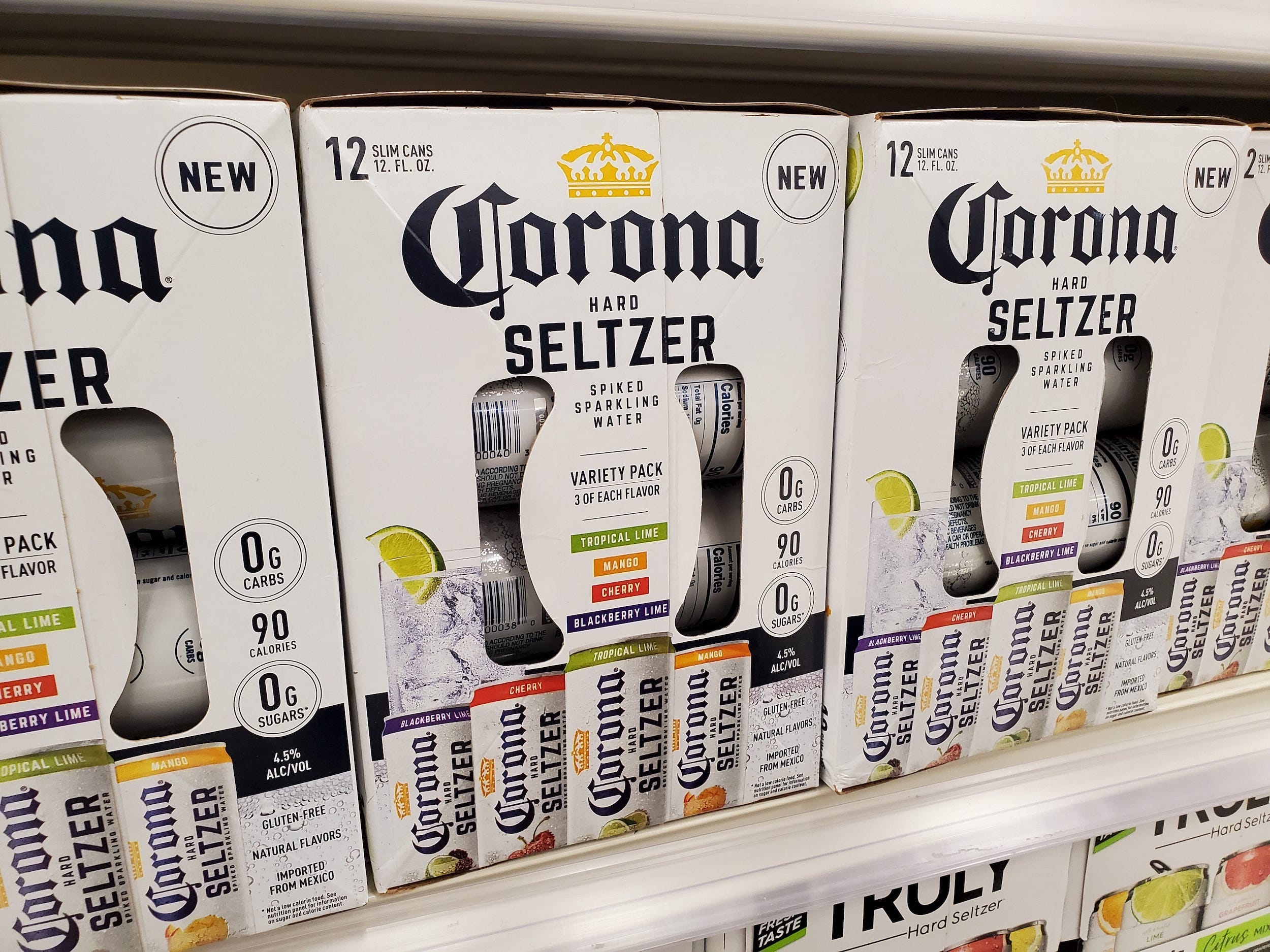 Cases of Corona Seltzer on a shelf in a store