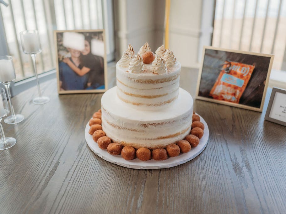 A wedding cake lined with Taco Bell's Cinnabon Delights.