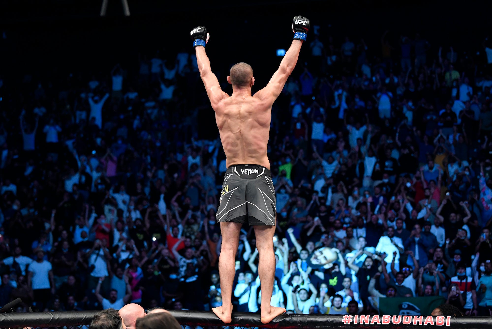 Khamzat Chimaev celebrates his dominant and ruthless win at UFC 267.