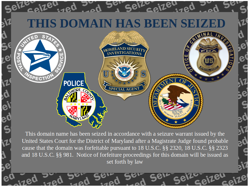 An image with police and federal badges saying "This Domain has been seized"