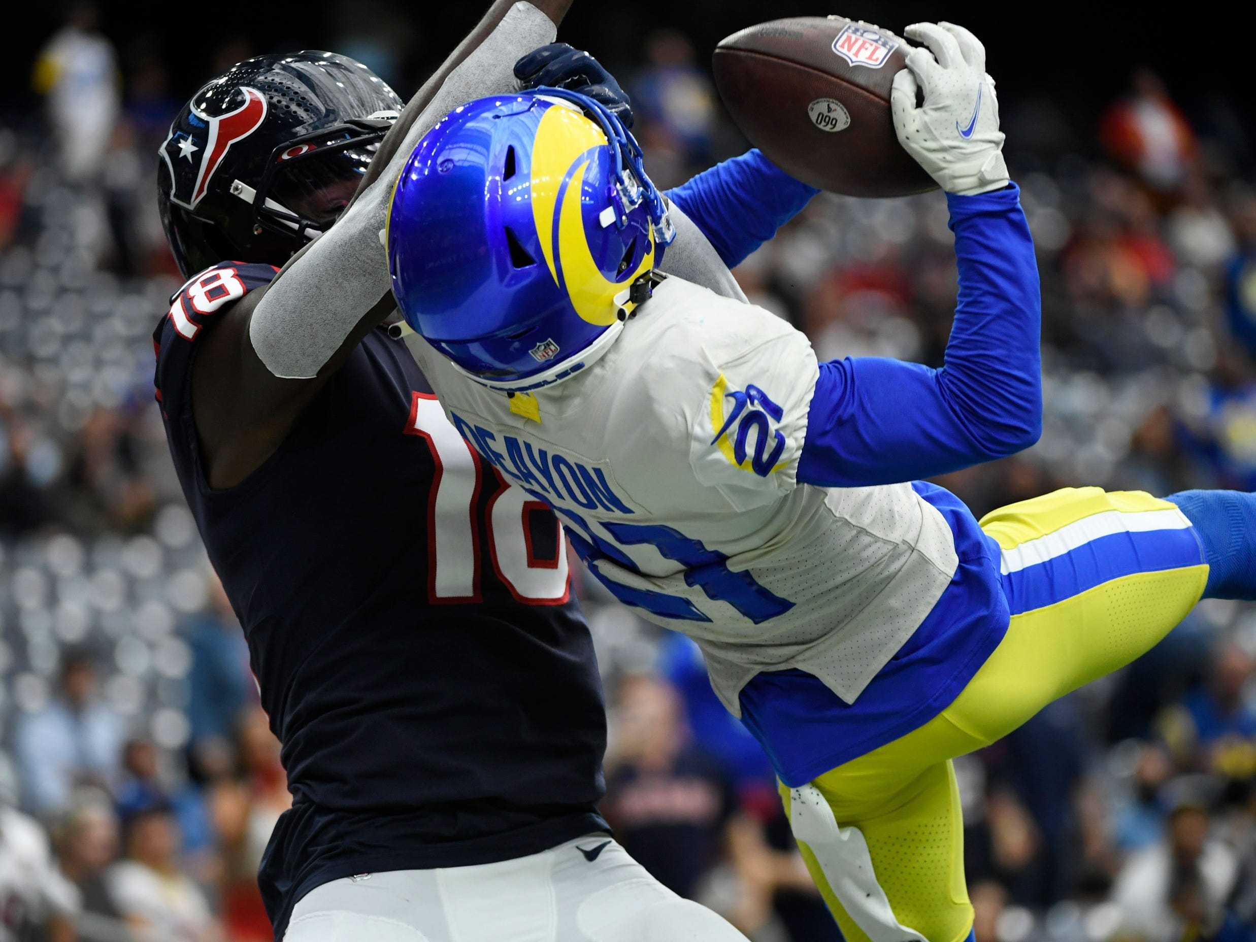 Los Angeles Rams cornerback Donte' Deayon breaks up a pass intended for Houston Texans wide receiver Chris Conley.