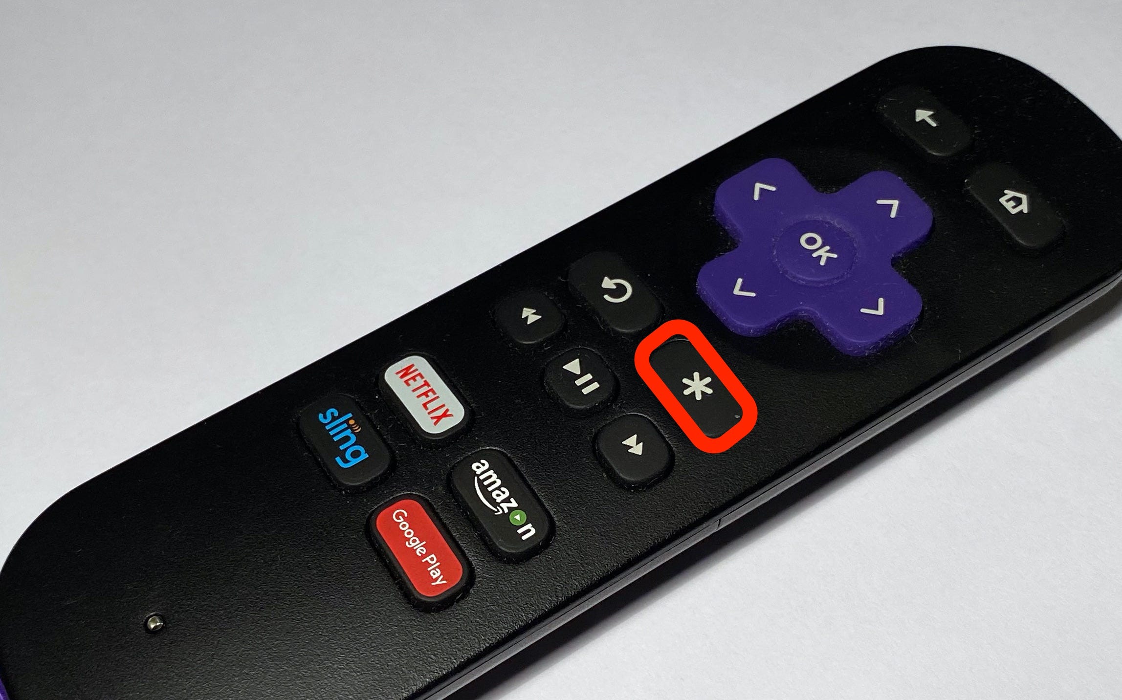 Image of Roku remote with asterisk button highlighted