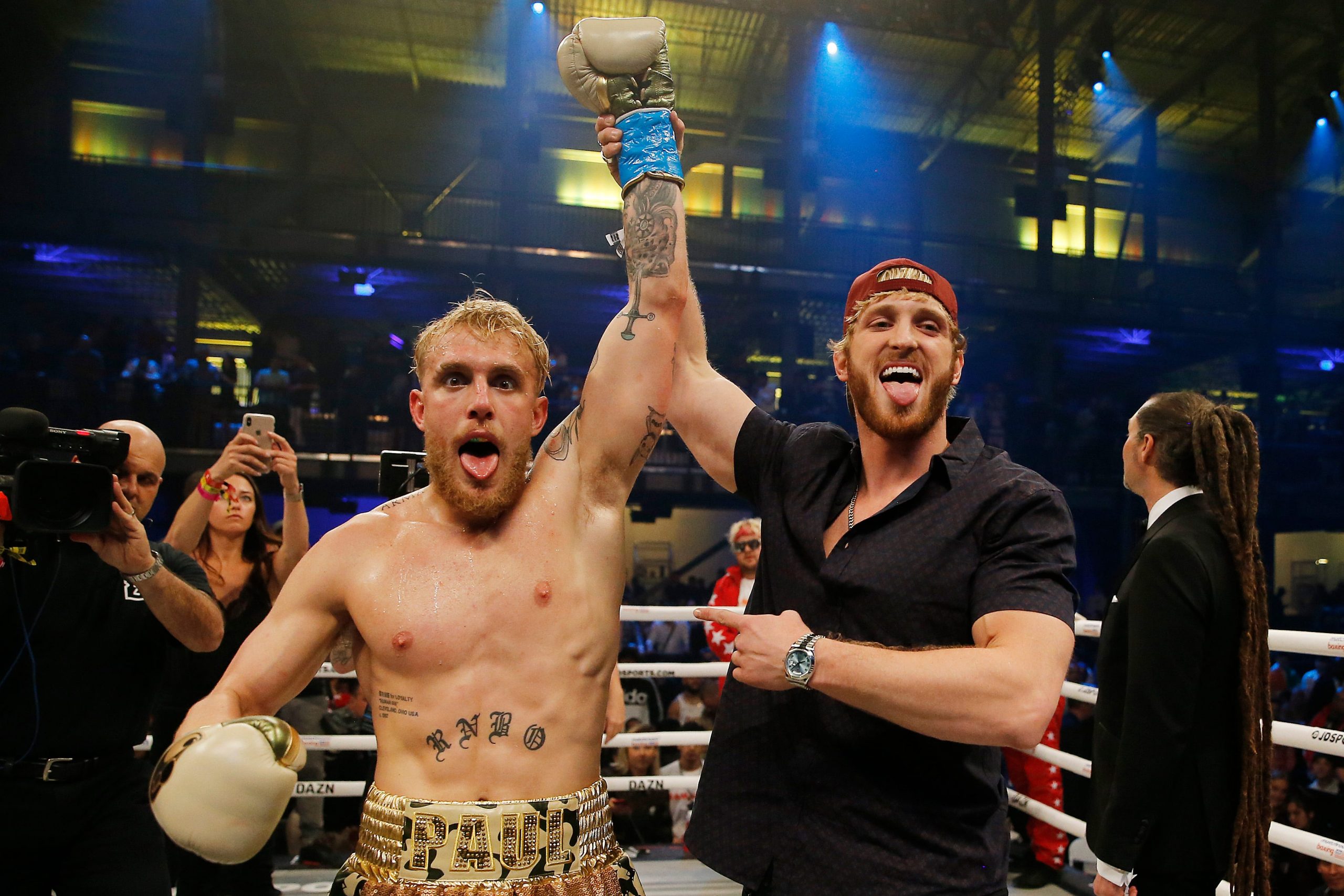 Logan and Jake Paul at a boxing match