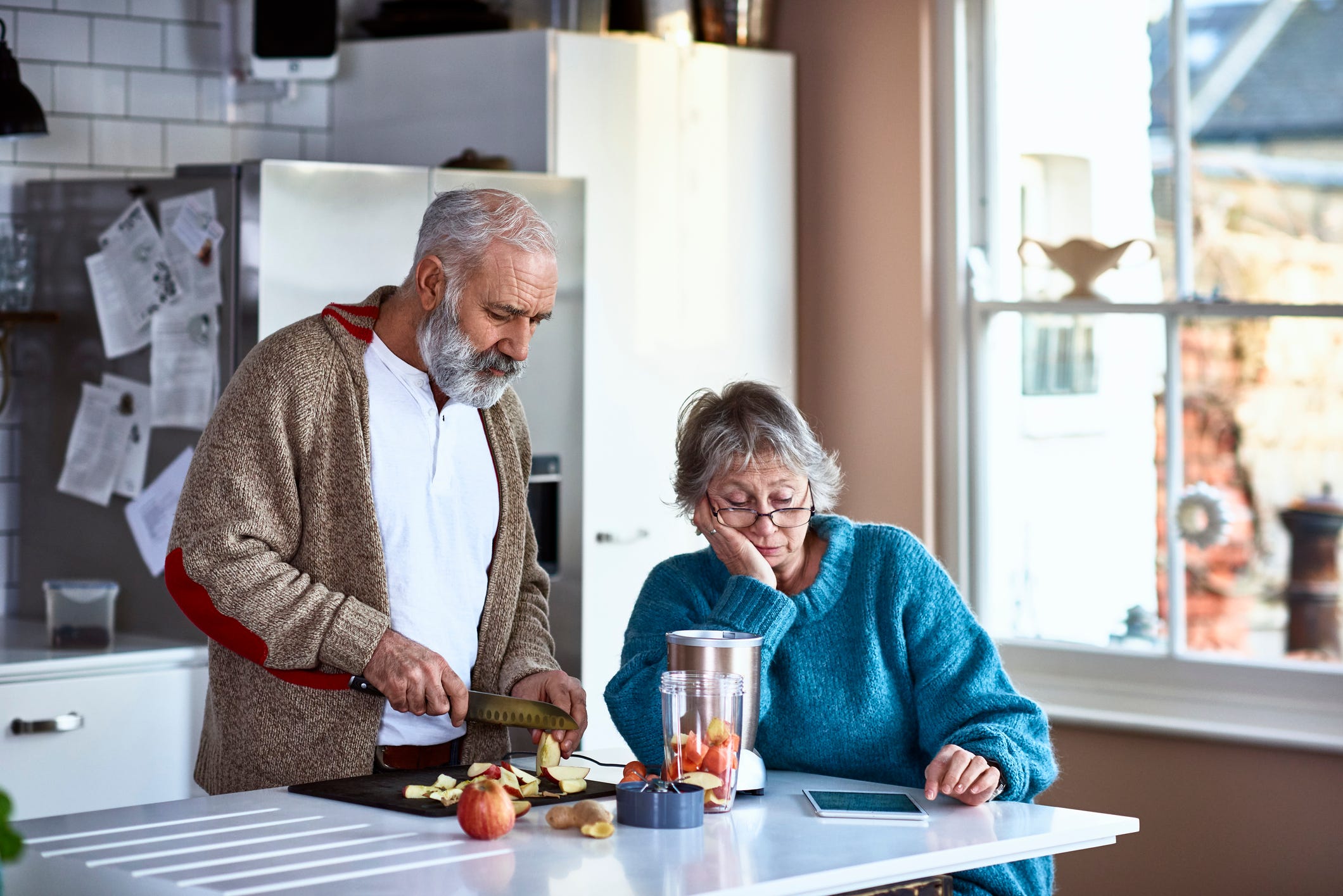 Retired couple in kitchen