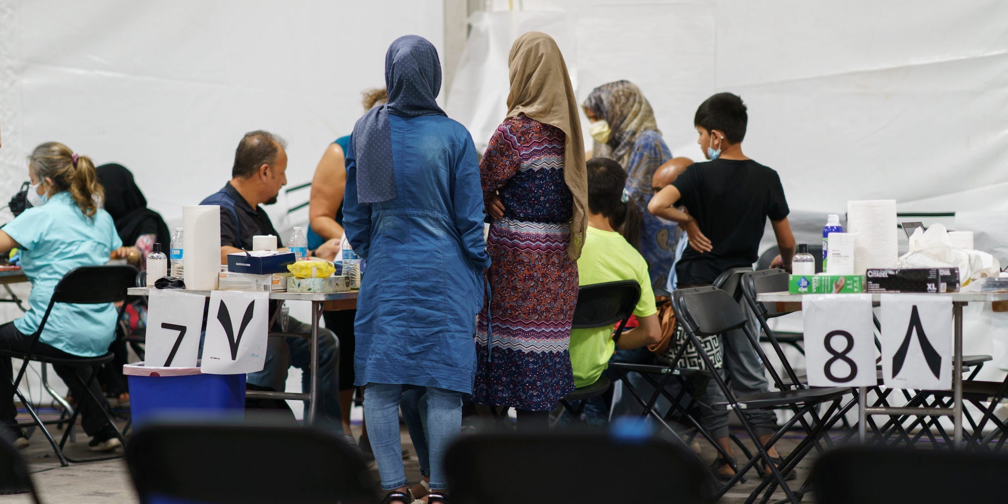 Afghan refugees are processed at Fort Bliss' Doña Ana Village where they are being housed, in New Mexico, Friday, Sept. 10, 2021.