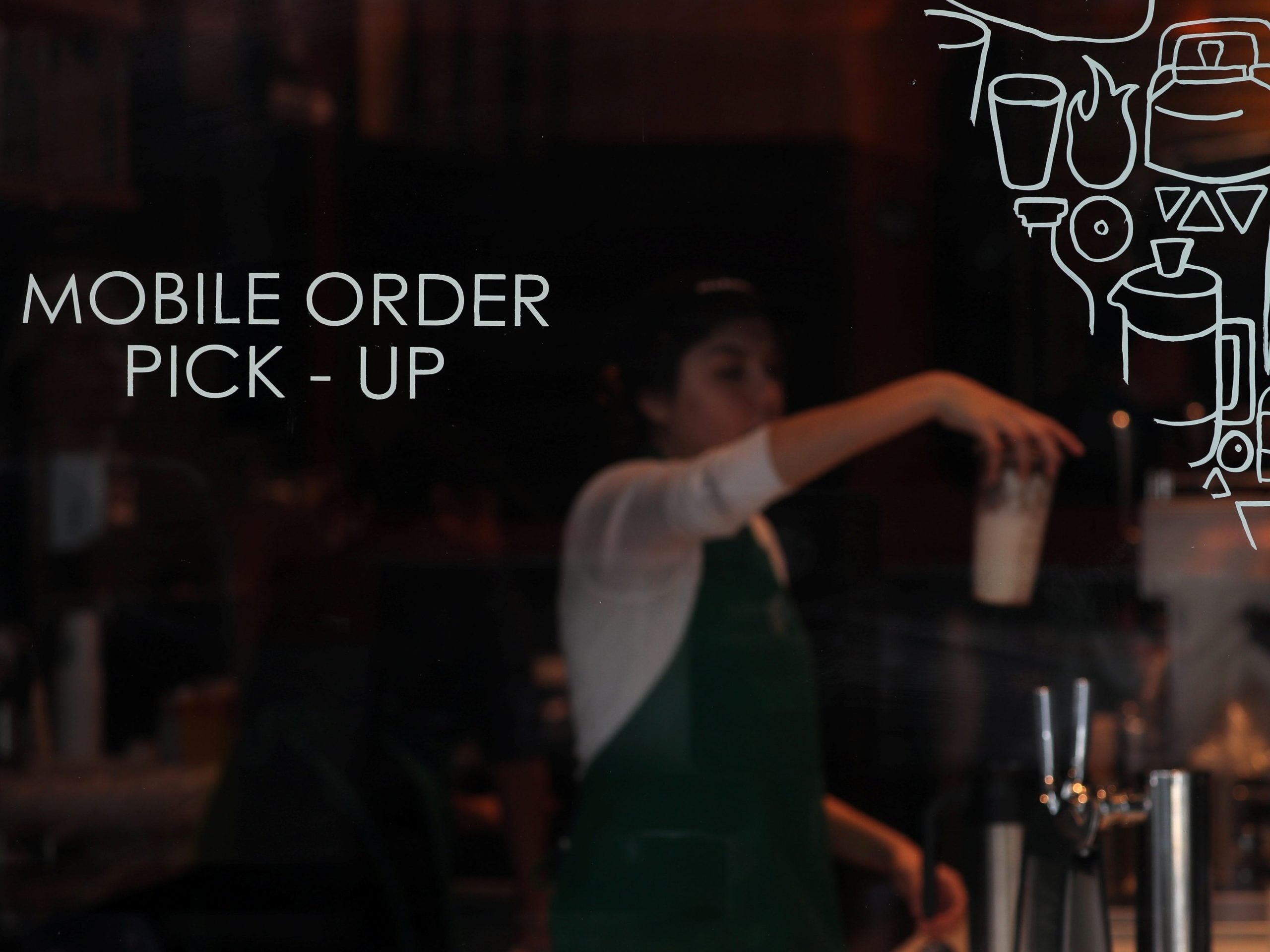 Starbucks barista makes mobile orders