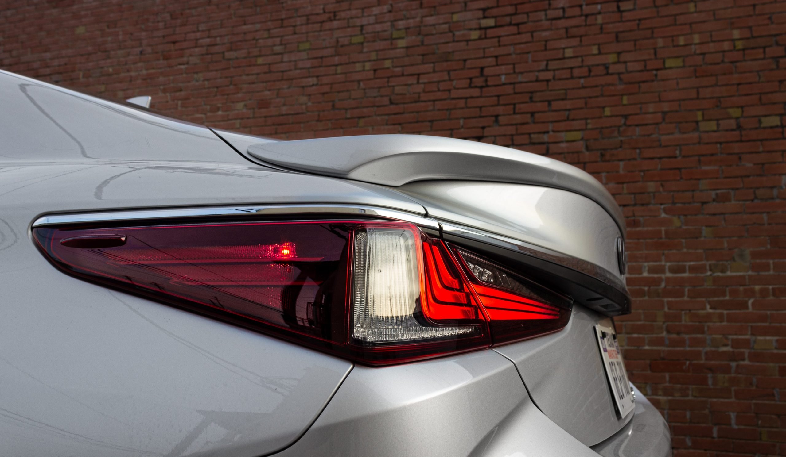 A silver Lexus ES 300h.