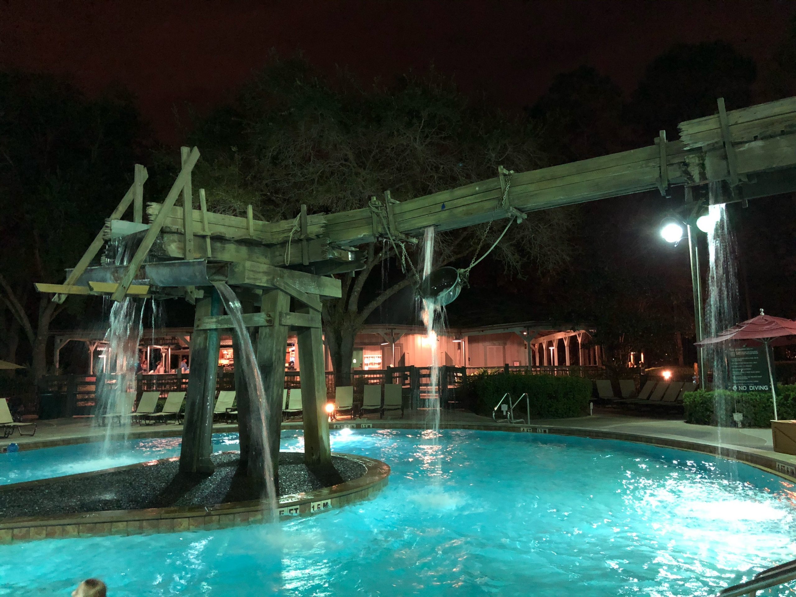 shot of the pool at Port Orleans Riverside disney resort at night