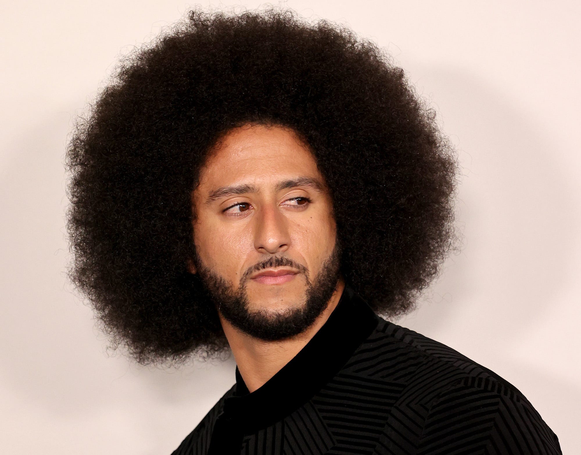 Colin Kaepernick arrives at the Los Angeles premiere of Netflix's "Colin In Black And White" at Academy Museum of Motion Pictures