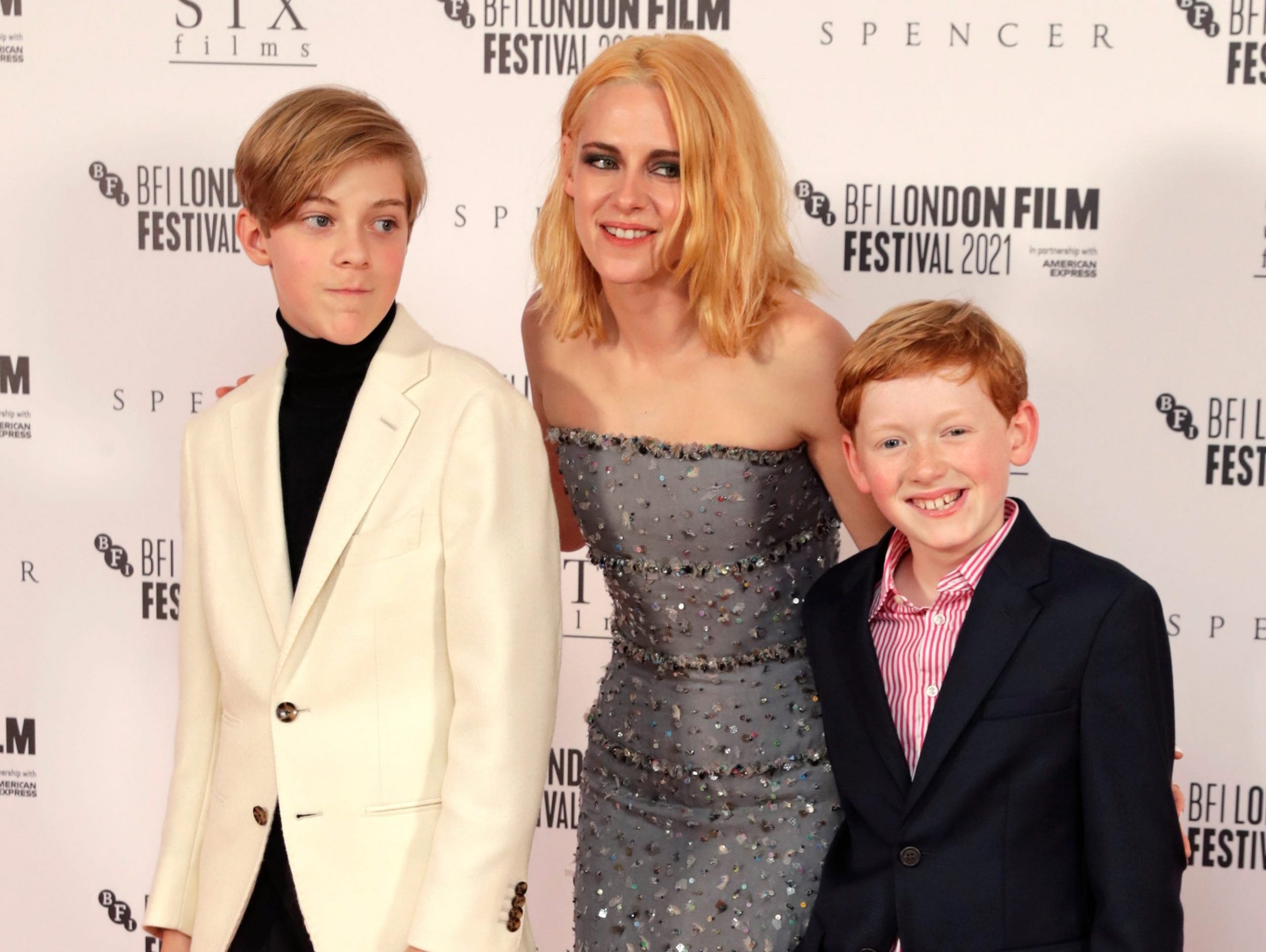 Jack Nielen, Kristen Stewart and Freddie Spry attend the "Spencer" UK Premiere during the 65th BFI London Film Festival at The Royal Festival Hall on October 07, 2021 in London, England.