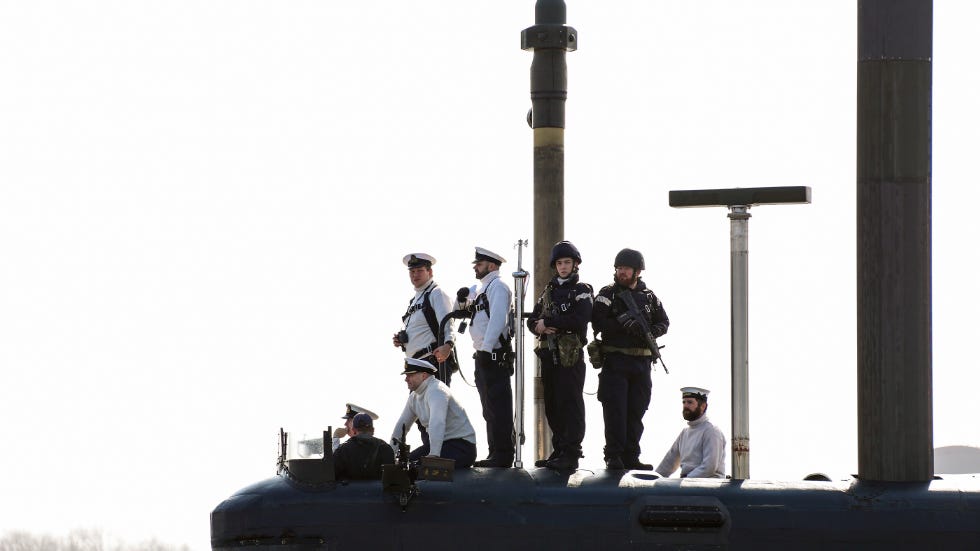 Sailors aboard British Royal Navy Trafalgar-class submarine