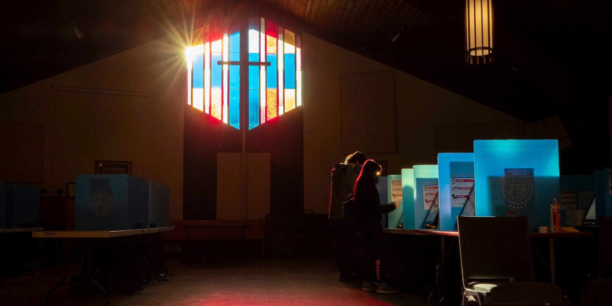 Voters mark their ballots at the Lawrenceville Road United Methodist Church in Tucker, Ga. during the Senate runoff election Tuesday morning, Jan. 5, 2021.