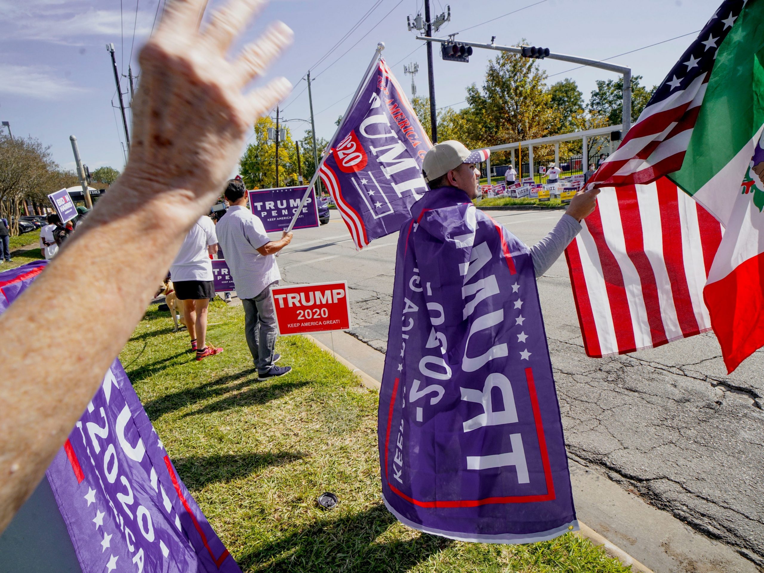 Supporters of former President Donald Trump rally in Houston, Texas on November 3, 2020.