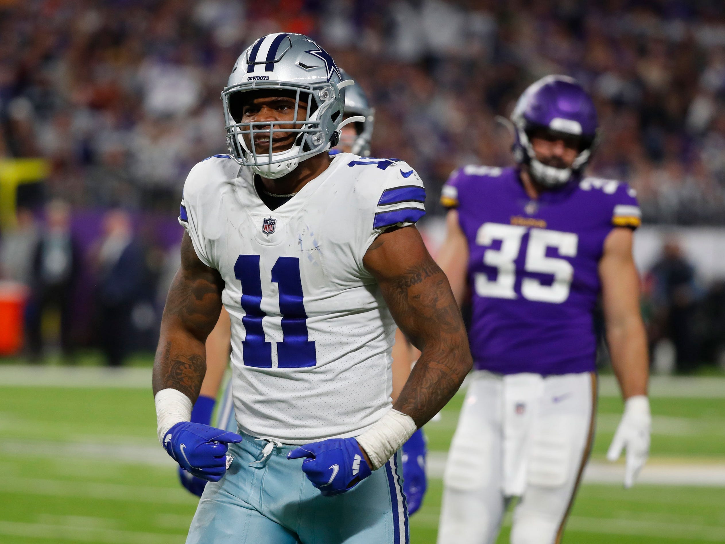 Micah Parsons celebrates a tackle against the Minnesota Vikings.