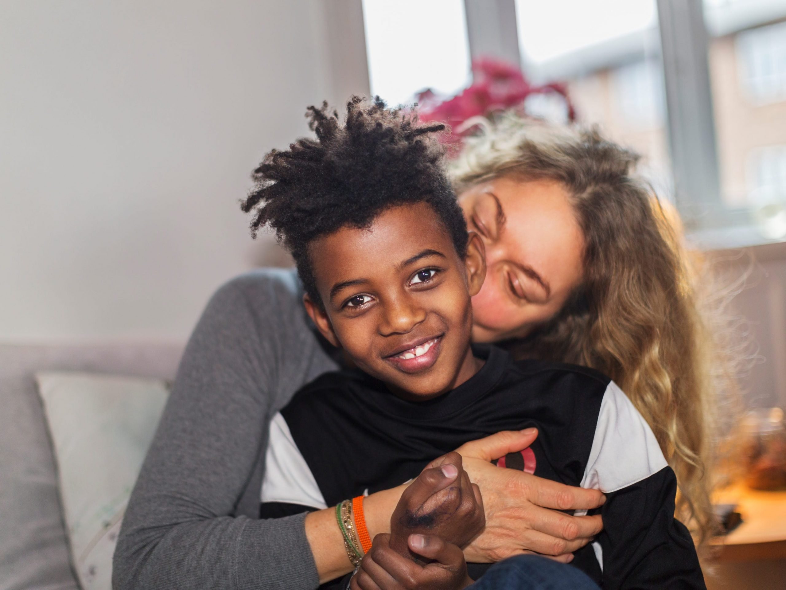 Mom and son hugging