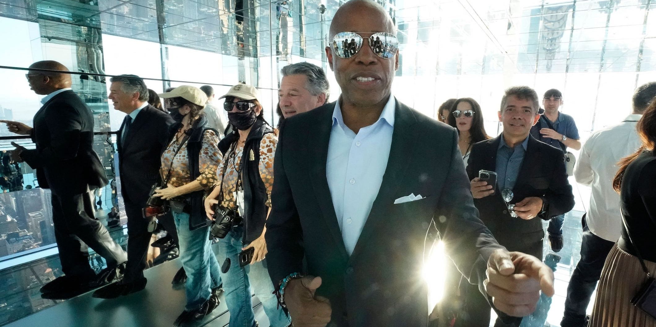 Democratic Nominee for Mayor Eric Adams (C) arrives before cutting the ribbon during the official opening of SUMMIT One Vanderbilt on October 21, 2021 in New York.