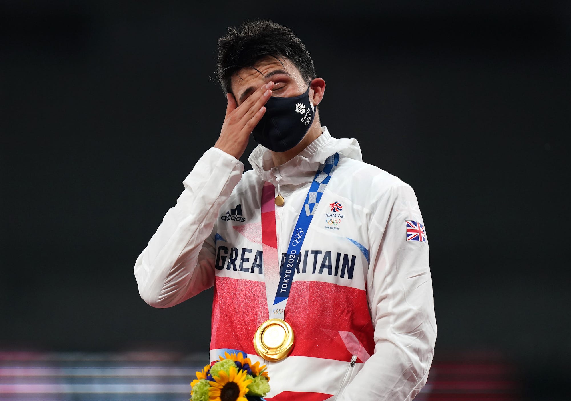 Joseph Choong of Great Britain with his gold medal following victory in the Modern Pentathlon, Men's Individual - Laser Run final at Tokyo Stadium on the fifteenth day of the Tokyo 2020 Olympic Games in Japan
