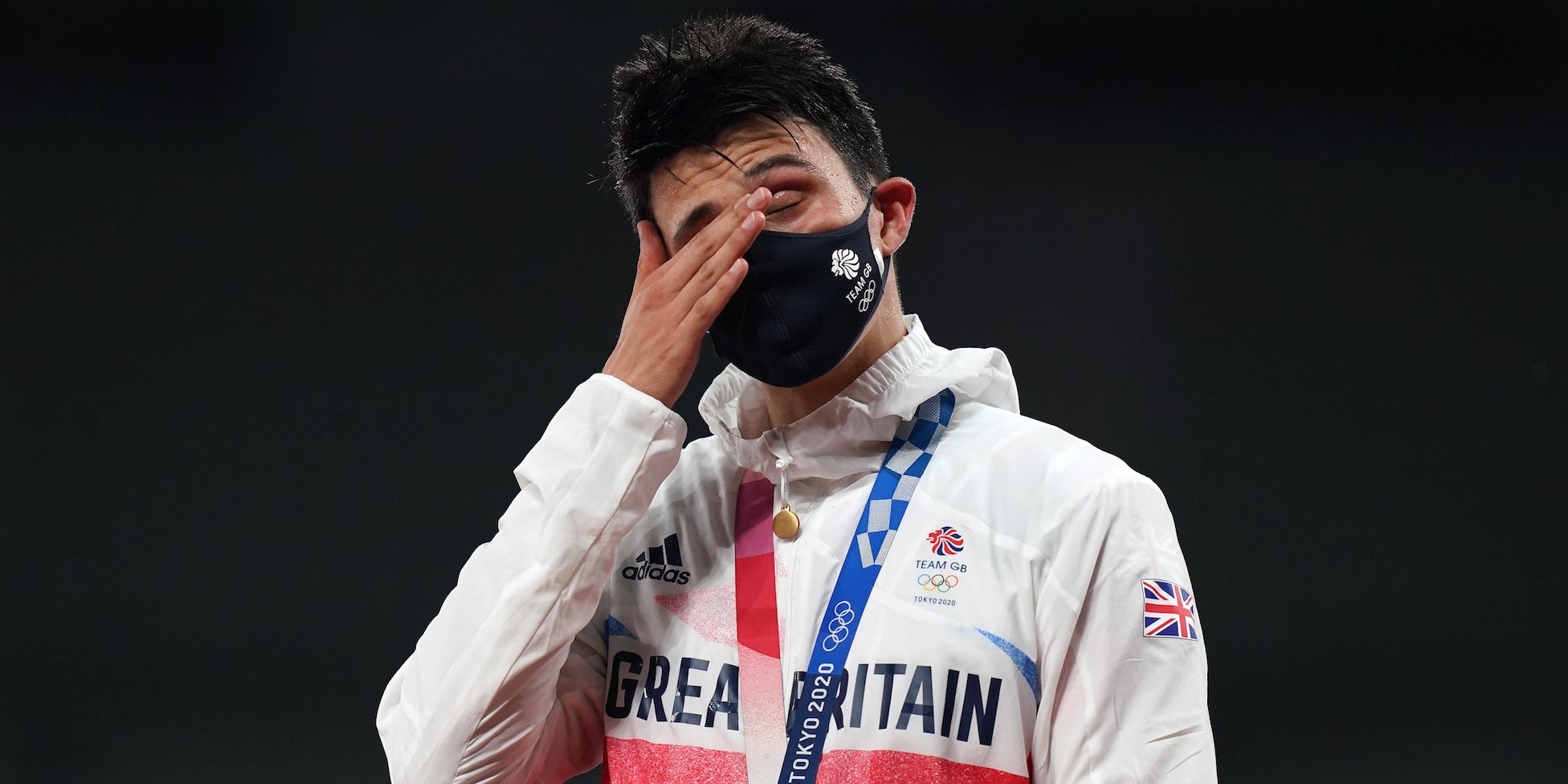 Joseph Choong of Great Britain with his gold medal following victory in the Modern Pentathlon, Men's Individual - Laser Run final at Tokyo Stadium on the fifteenth day of the Tokyo 2020 Olympic Games in Japan