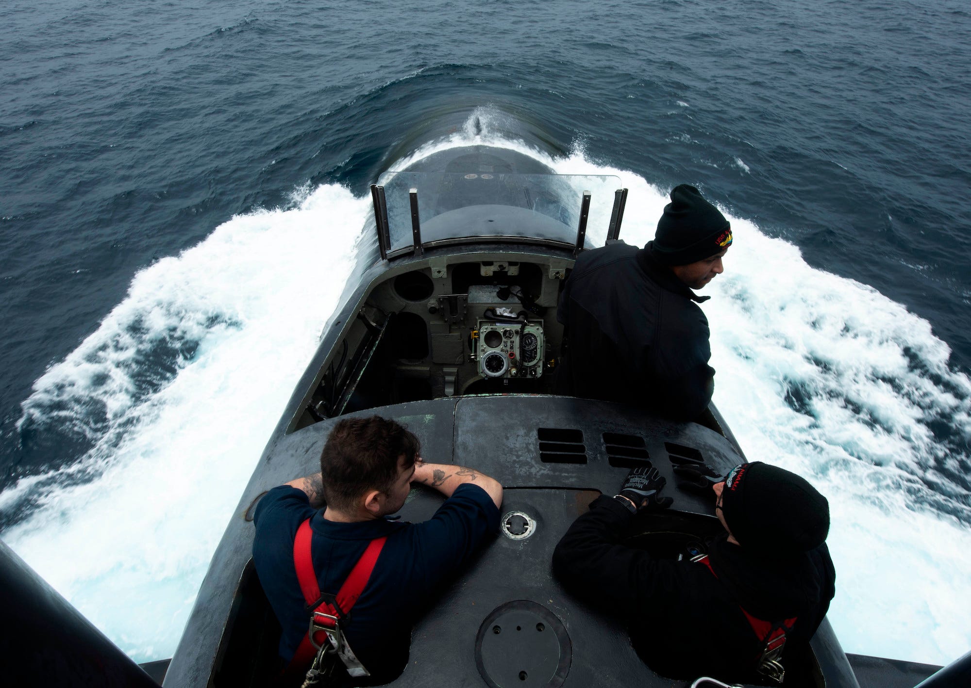 Sailors on bridge of Navy submarine USS Alabama
