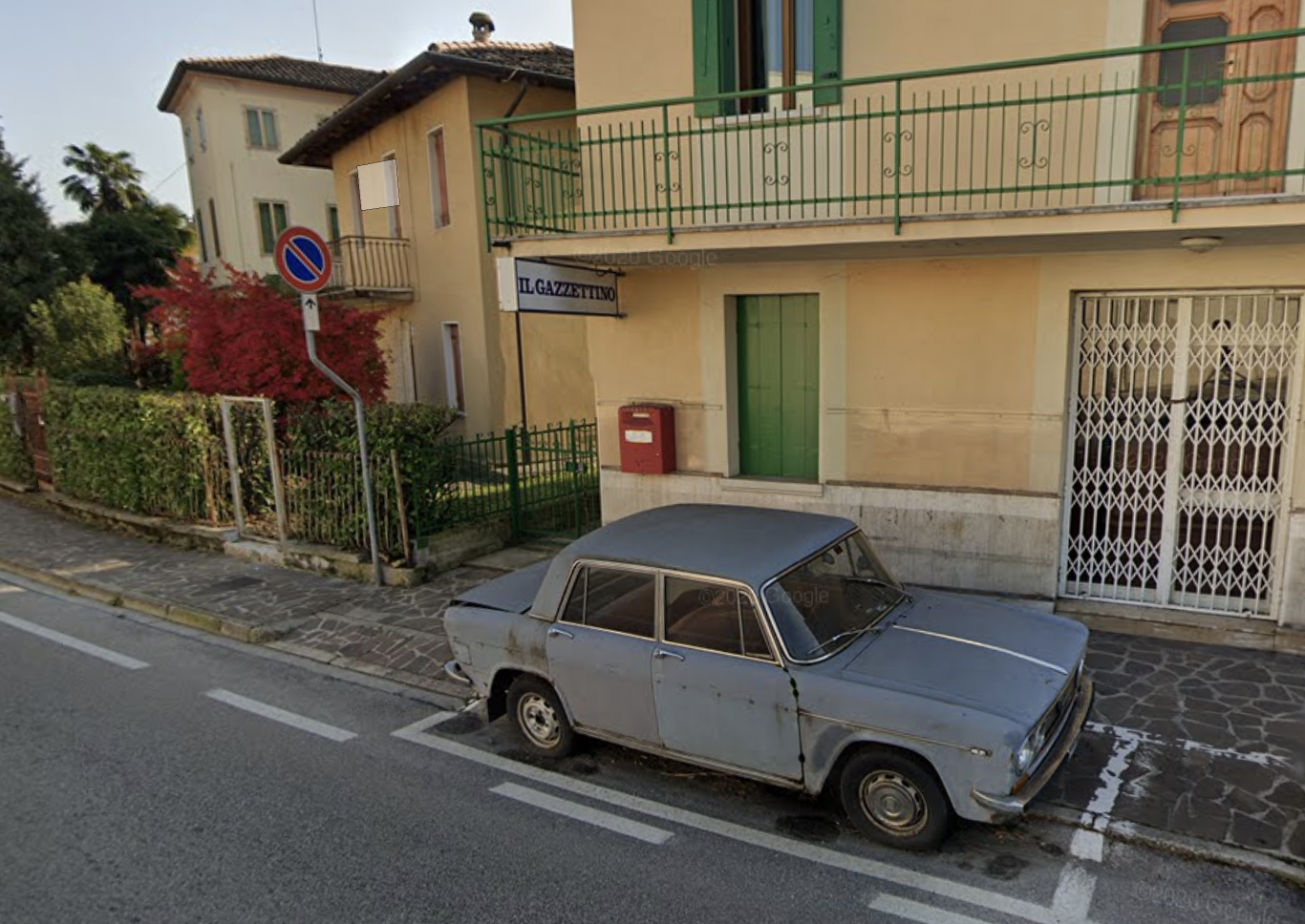 Angelo Fregolent's Lancia Fulvia parked on a street in Conegliano, Italy.