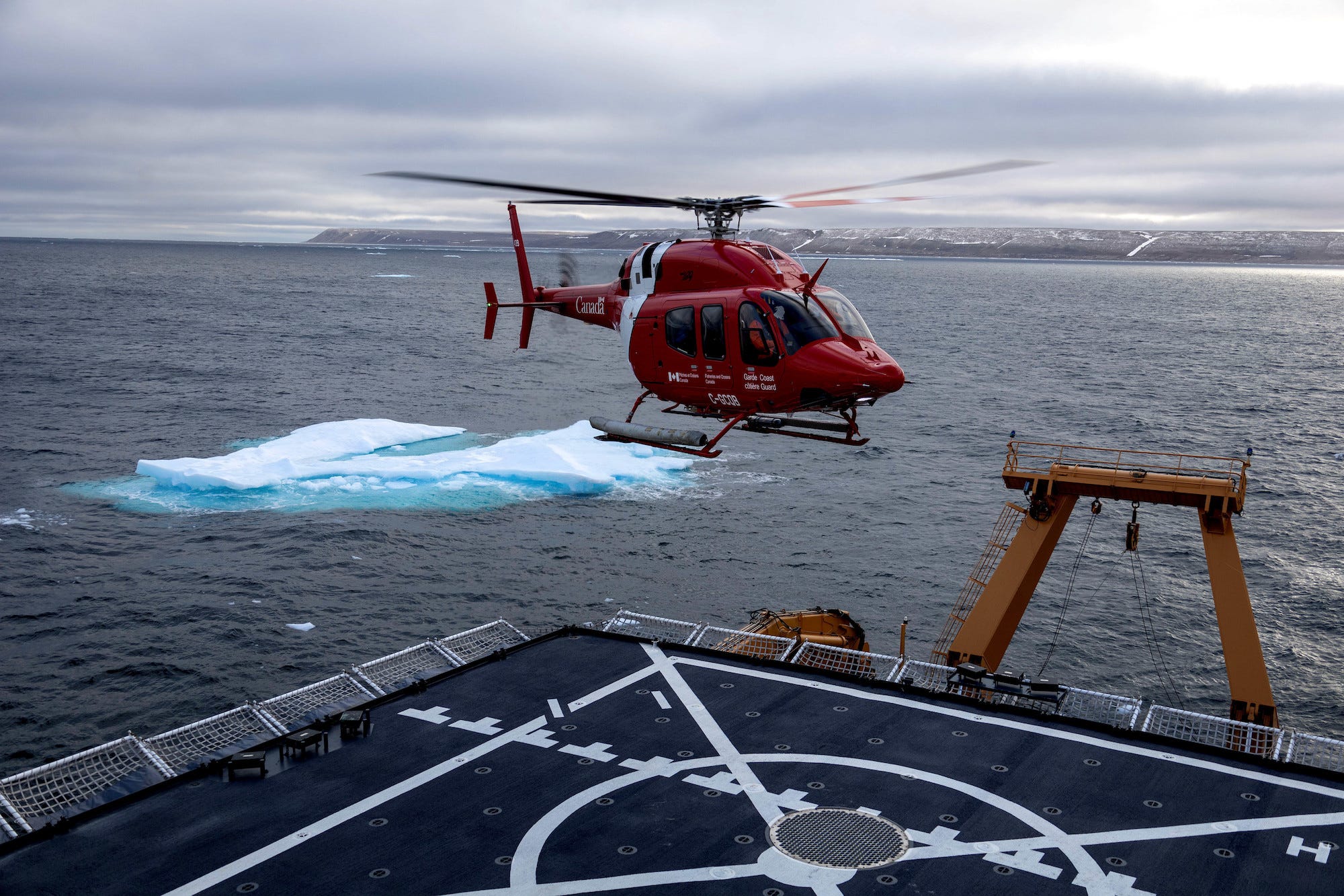 Canadian helicopter landing on Coast Guard icebreaker Healy