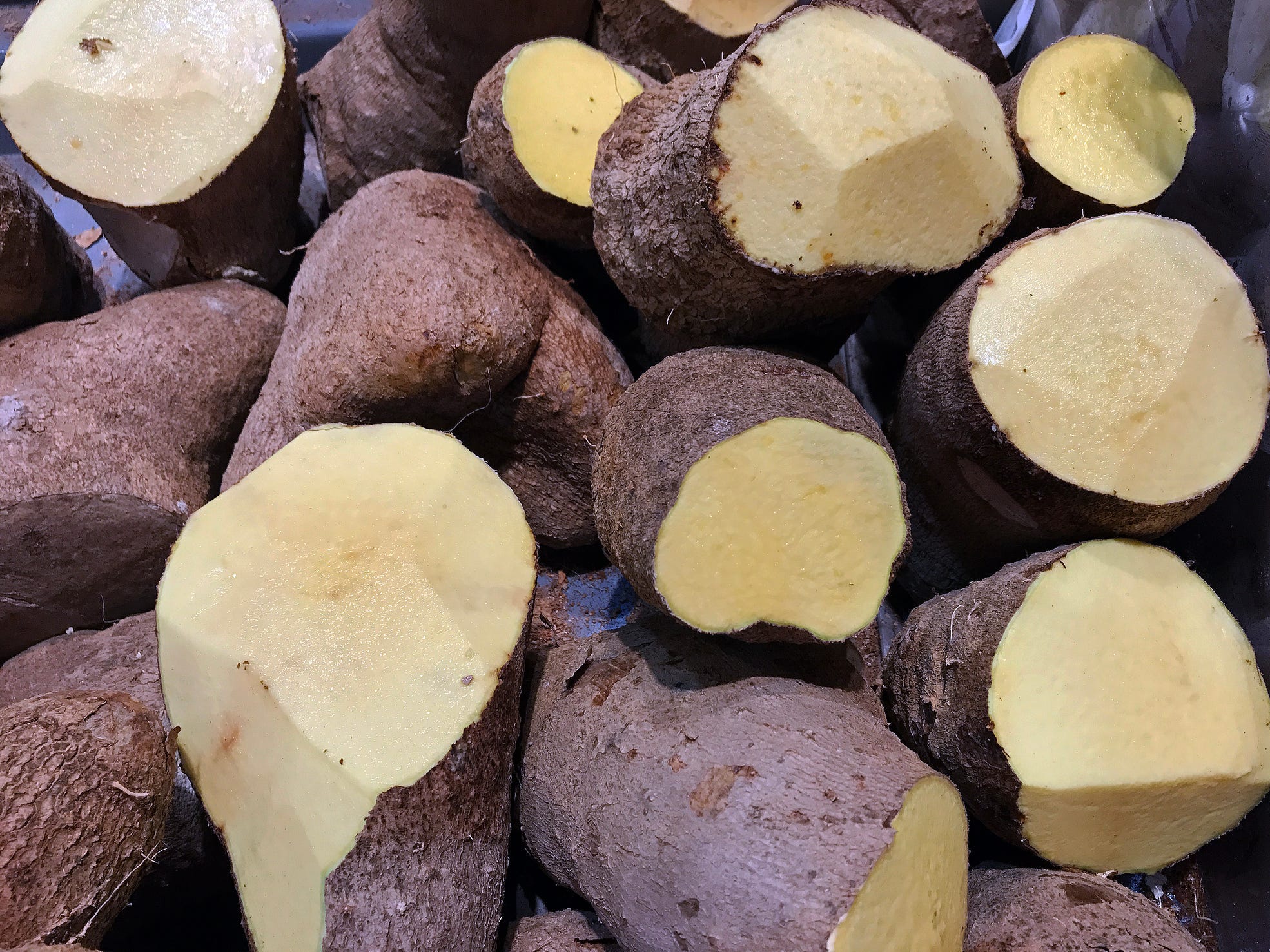 Heap of Yellow Yams in a market.