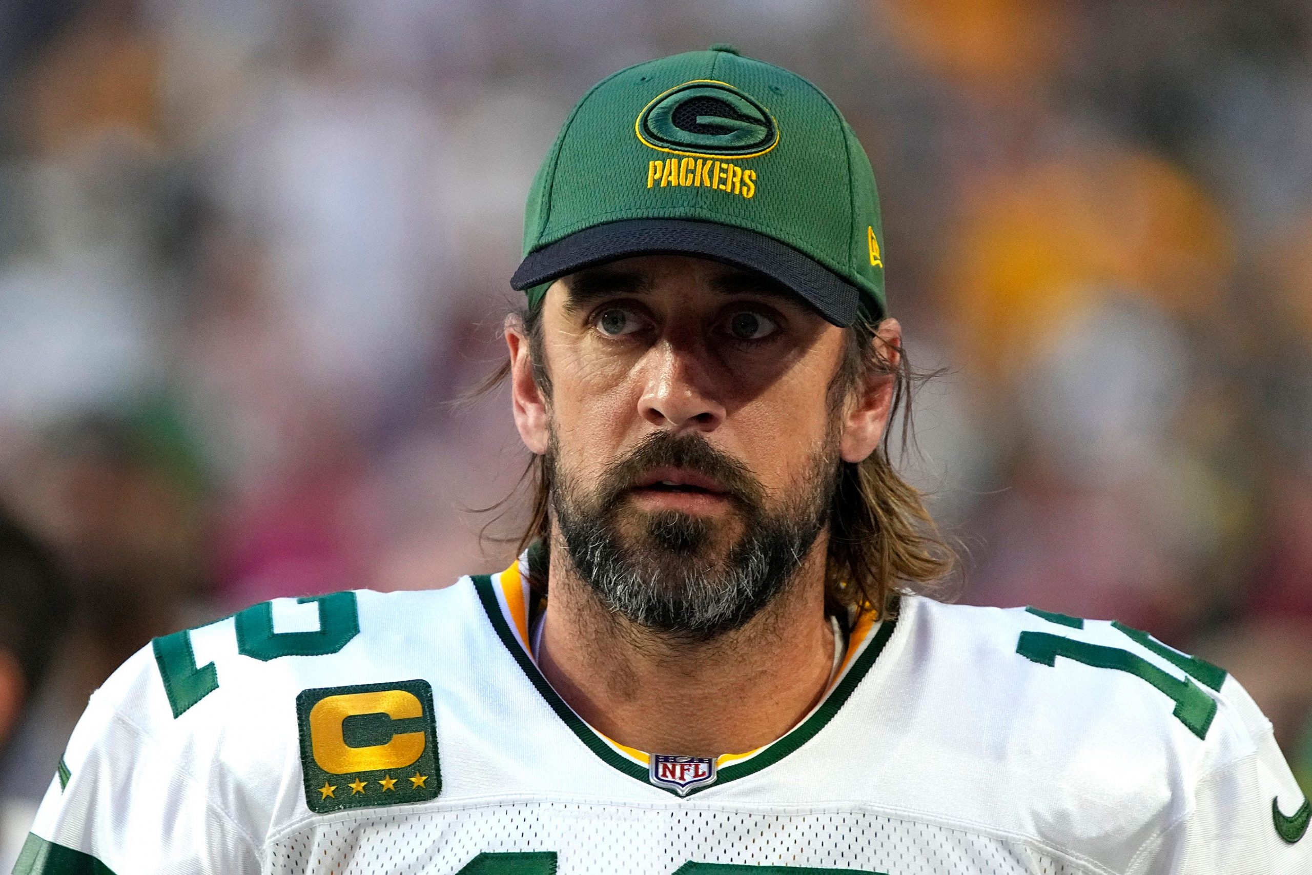 Aaron Rodgers on the field before a game against the Arizona Cardinals.