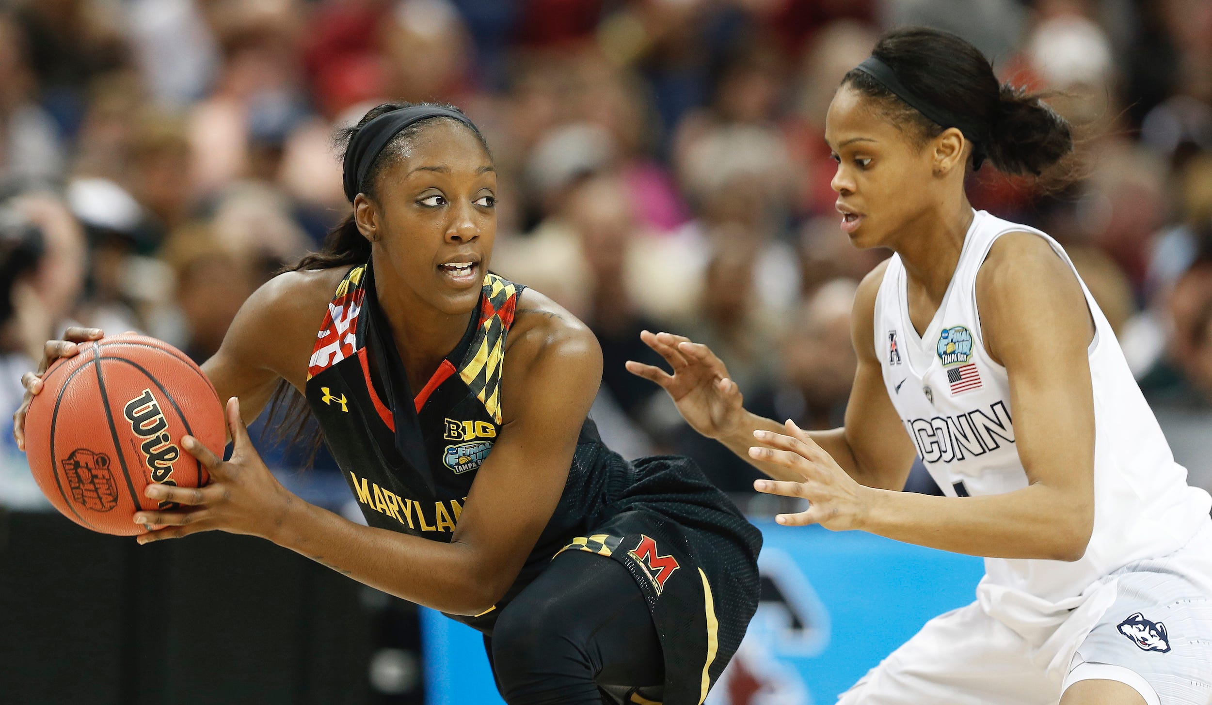 Maryland's Lauren Mincy (left) looks to pass against UConn guard Moriah Jefferson during their Final Four matchup in 2015.