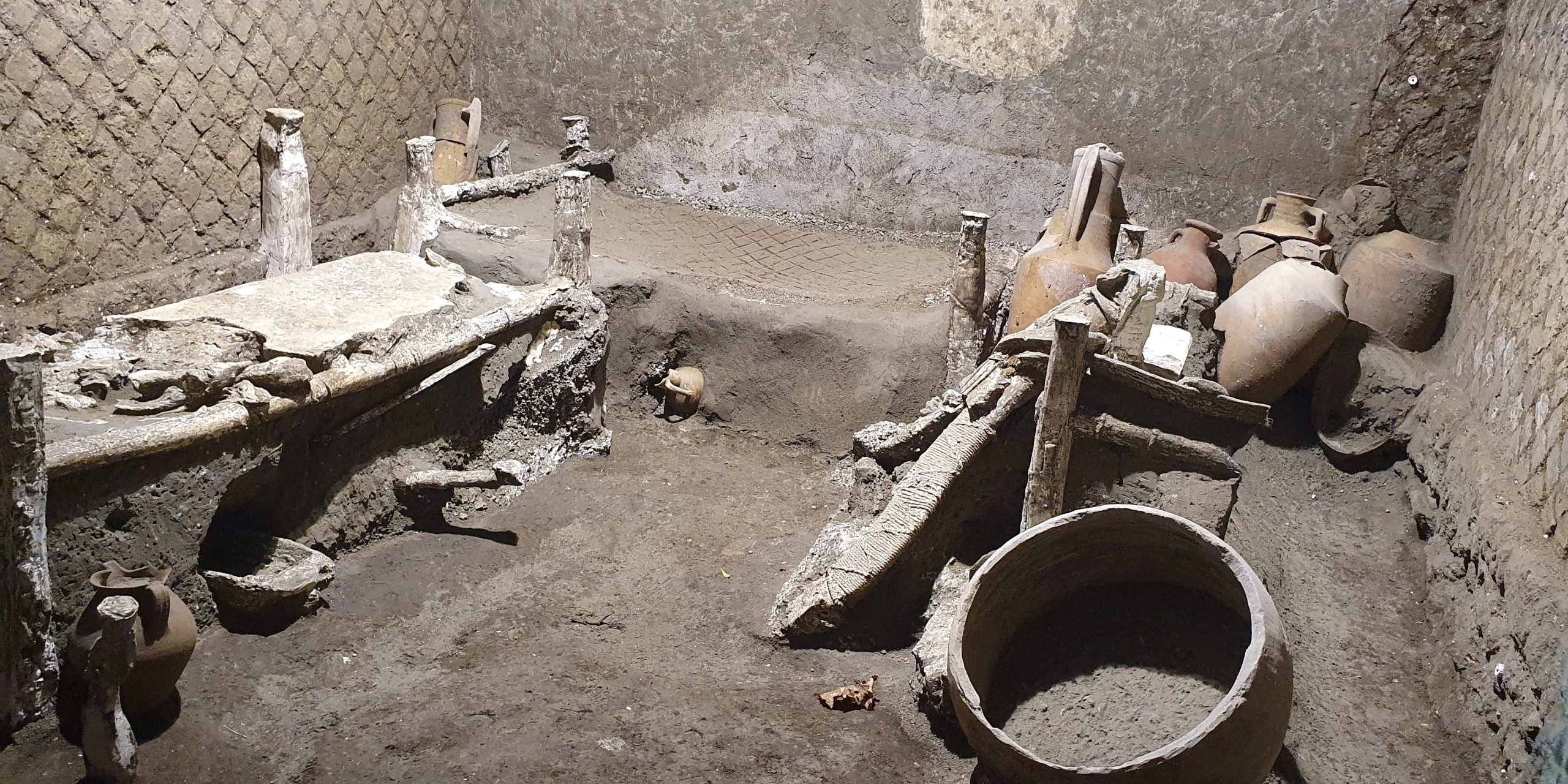 A "slaves room" at a Roman villa, containing beds, amphorae, ceramic pitchers and a chamber pot is discovered in a dig near the ancient Roman city of Pompeii, destroyed in 79 AD in volcanic eruption, Italy, 2021