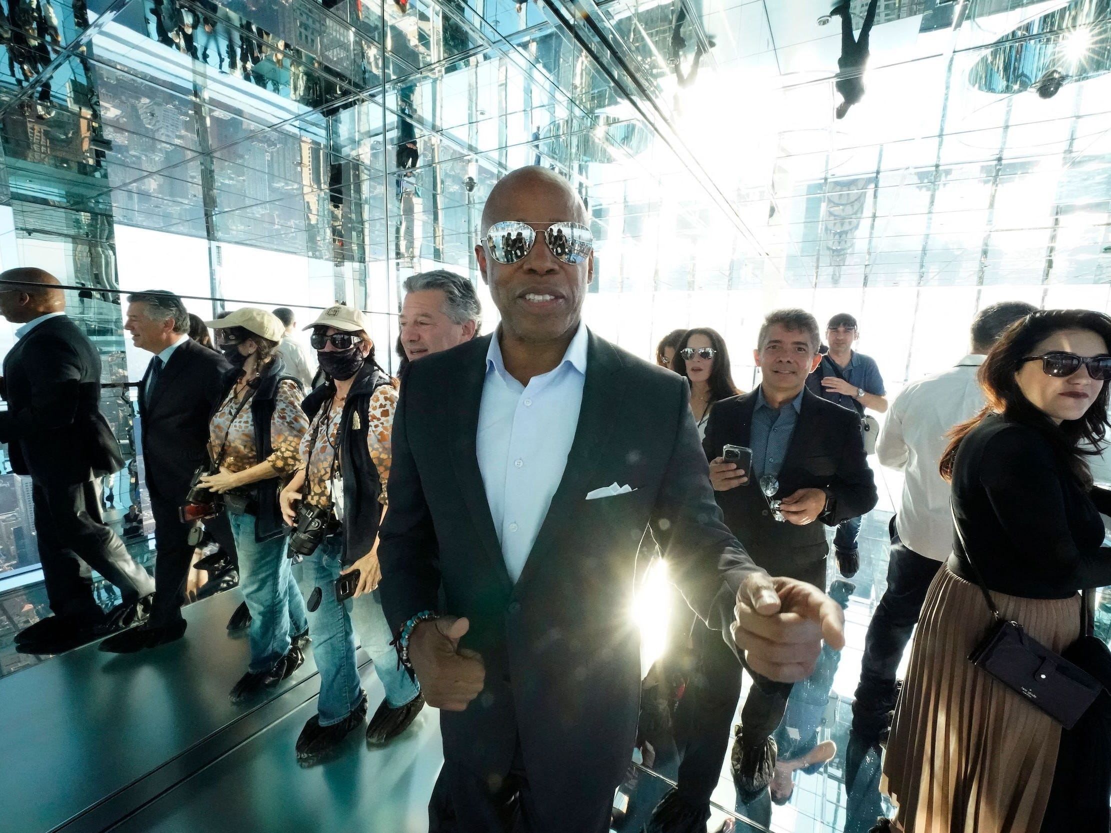 Democratic Nominee for Mayor Eric Adams (C) arrives before cutting the ribbon during the official opening of SUMMIT One Vanderbilt on October 21, 2021 in New York.
