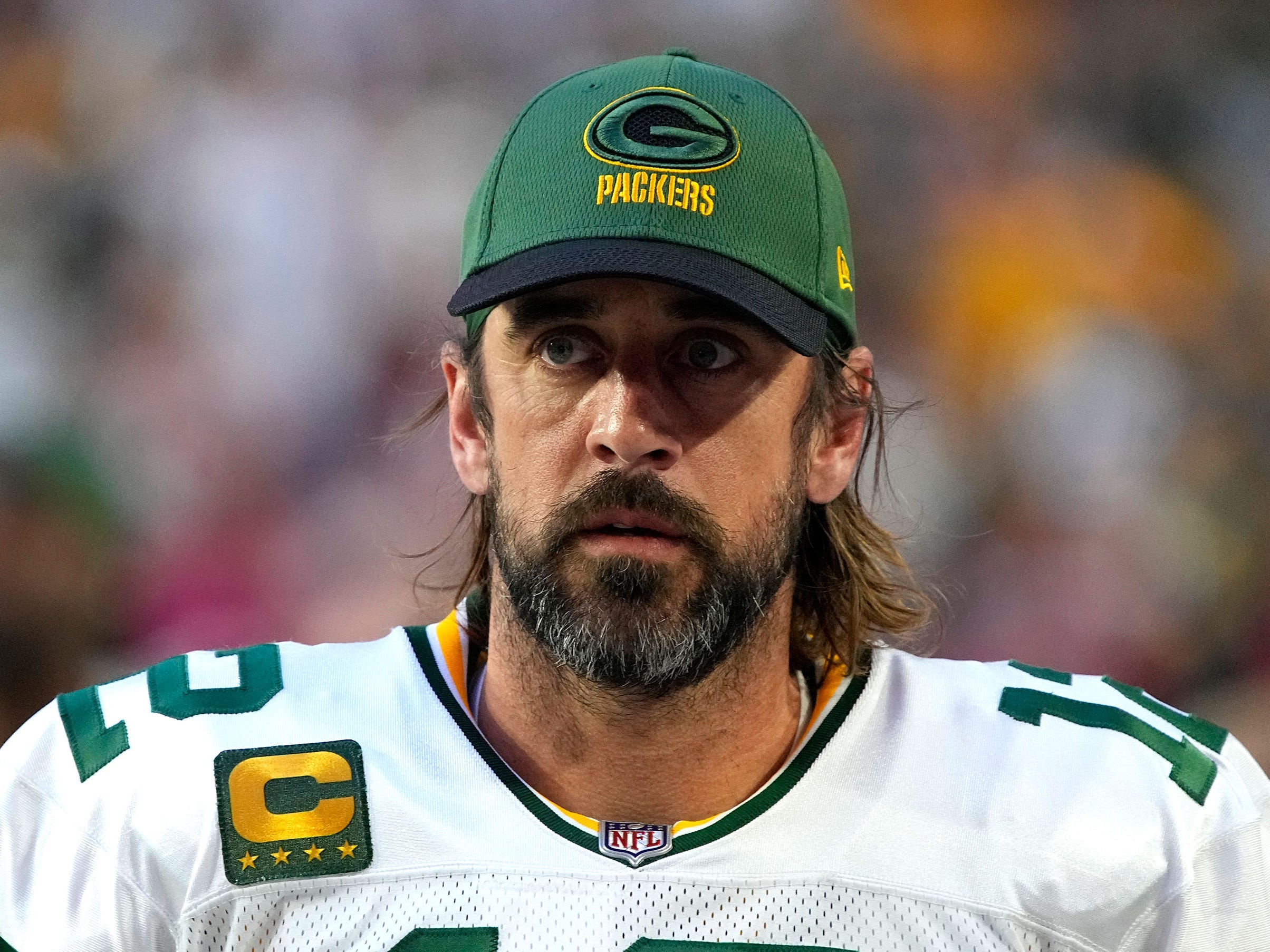 Aaron Rodgers on the field before a game against the Arizona Cardinals.