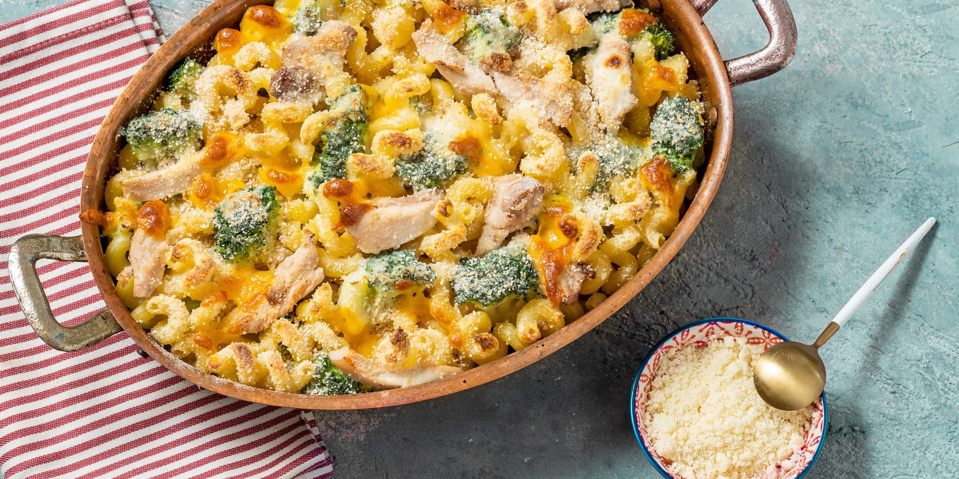 Baked broccoli and chicken pasta with breadcrumbs on top.