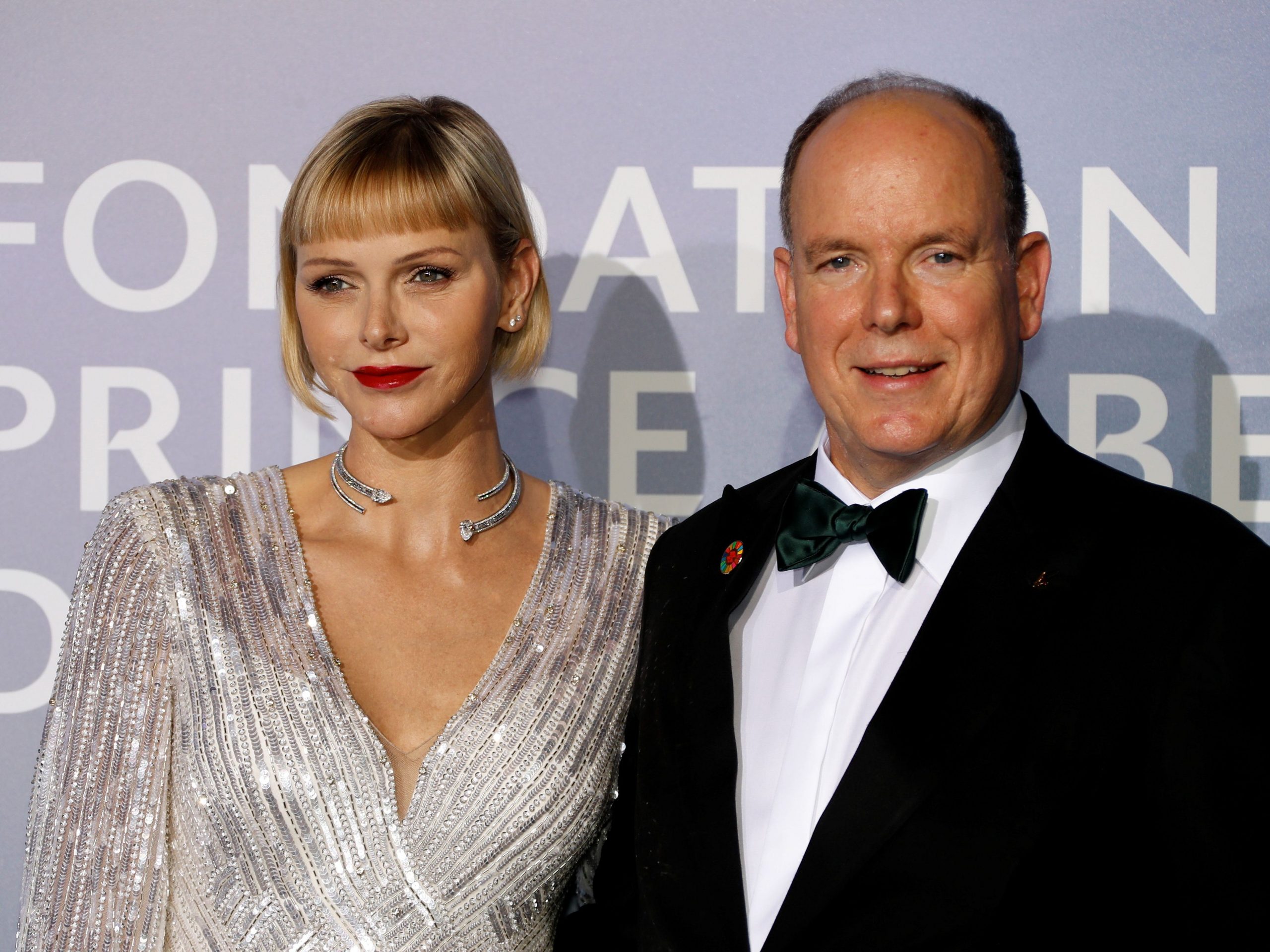 Prince Albert II of Monaco and Princess Charlene of Monaco pose on the red carpet ahead of the 2020 Monte-Carlo Gala for Planetary Health in Monaco on September 24, 2020.