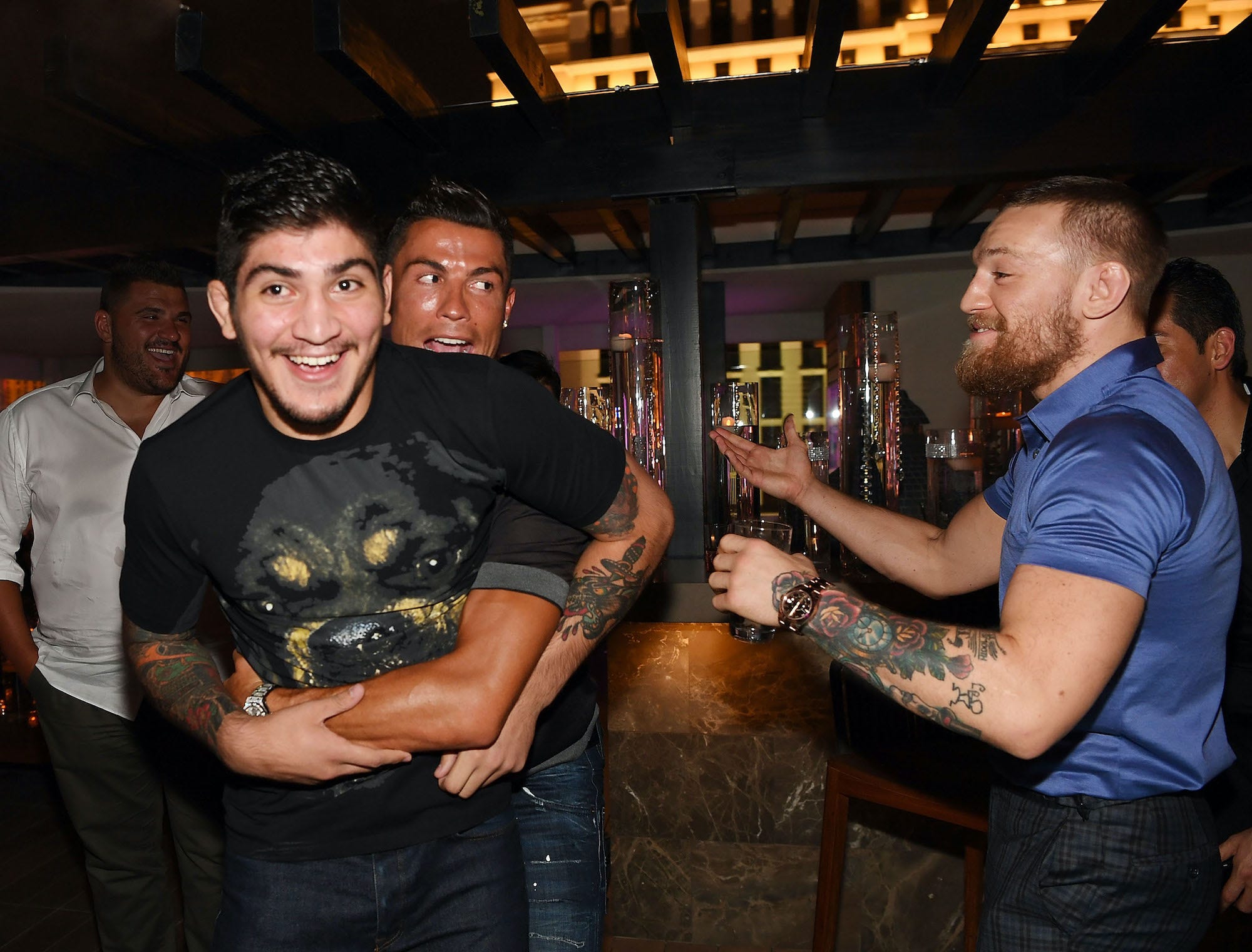 Dillon Danis and Conor McGregor joke around at an event.