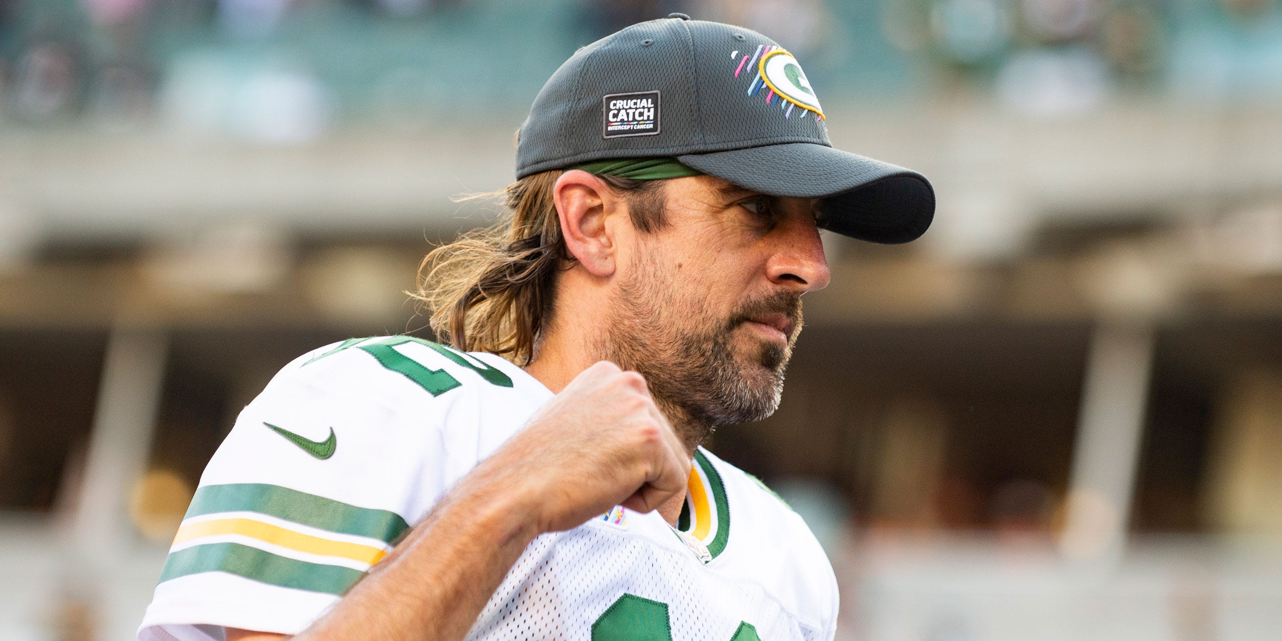 Aaron Rodgers walks off the field after a win over the Cincinnati Bengals.