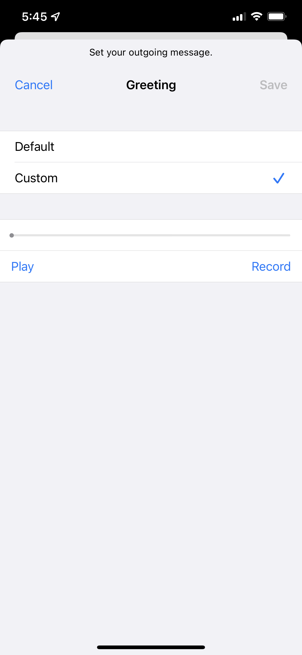 Creating a custom voicemail greeting on iOS.