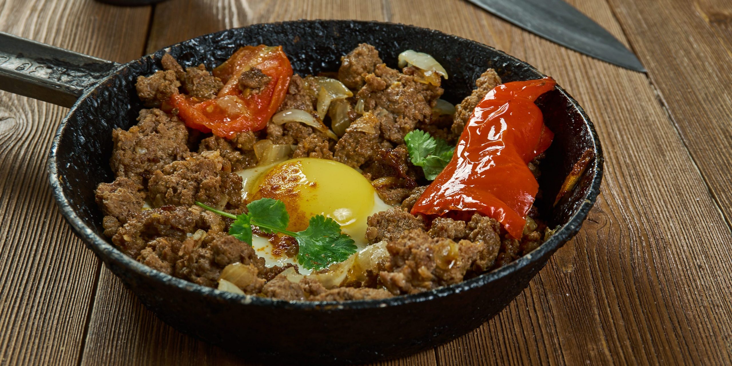 Makhlama Lahm - Iraqi Eggs with Lamb and Tomatoes, breakfast dish, ground lamb is sautéed with onions, tomatoes, and parsley, seasoned