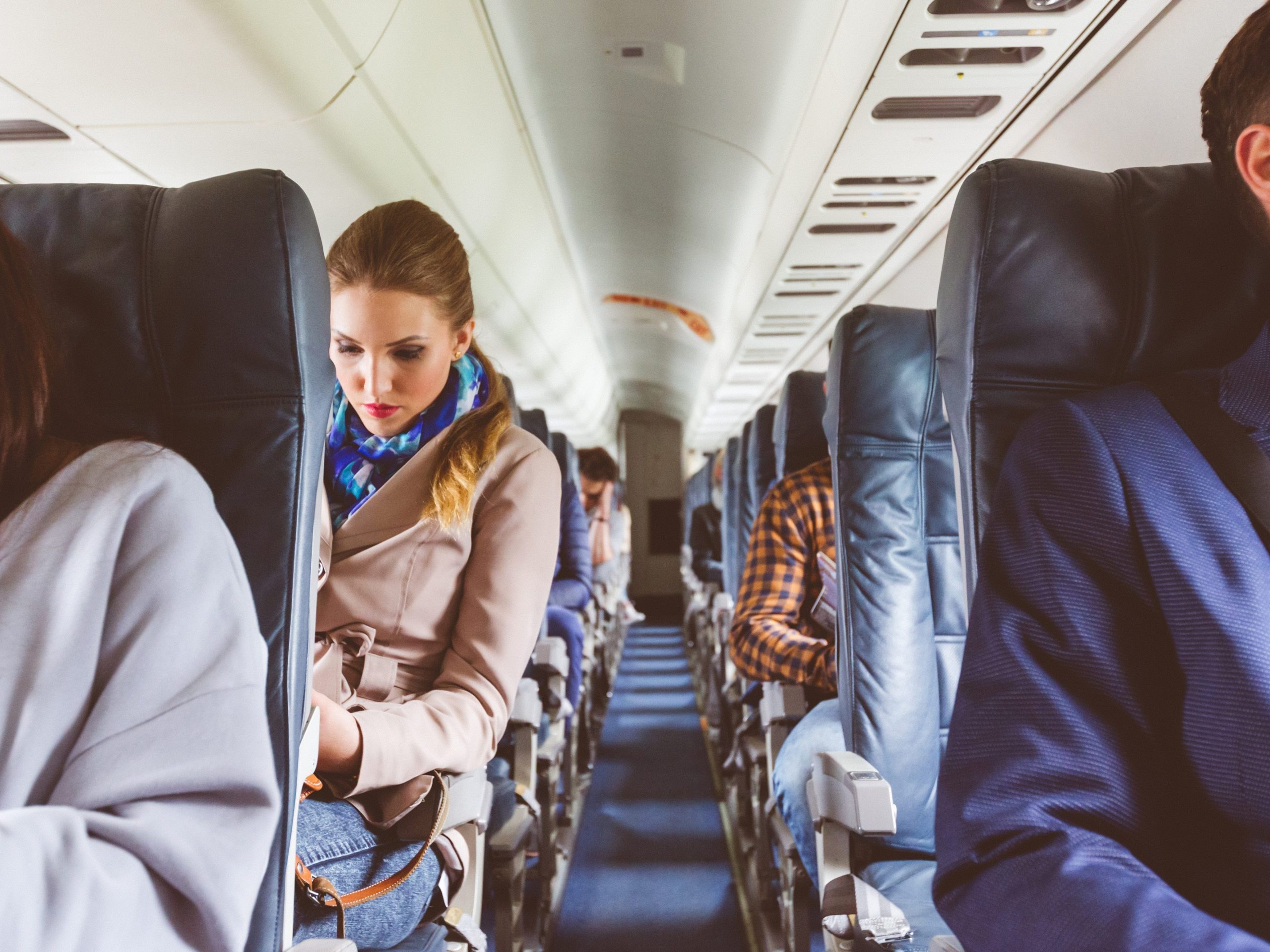 Passengers sitting on a flight