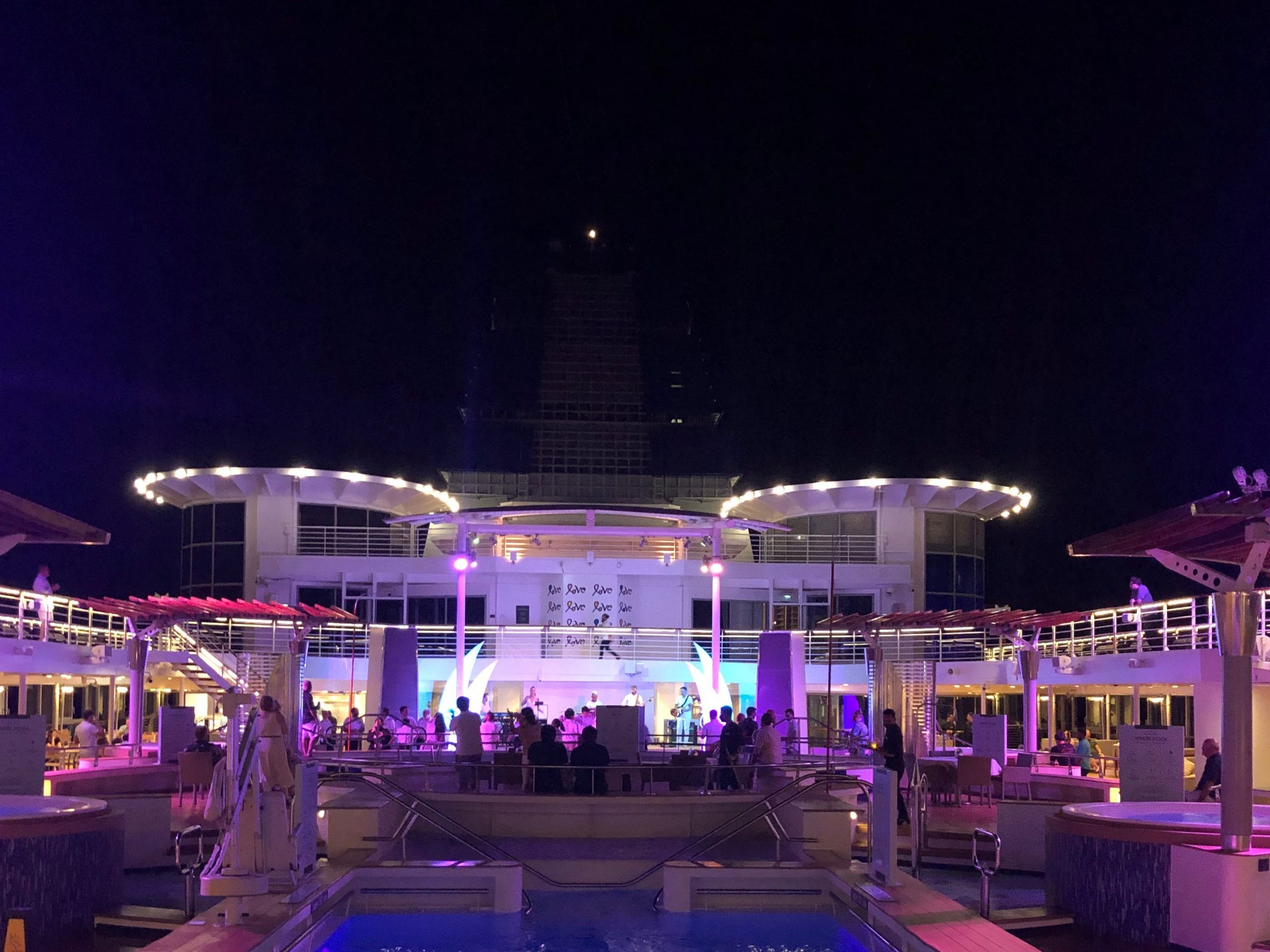 The cruise ship pool deck turned into a dance party one night, complete with neon lights, a live band, and line dances.