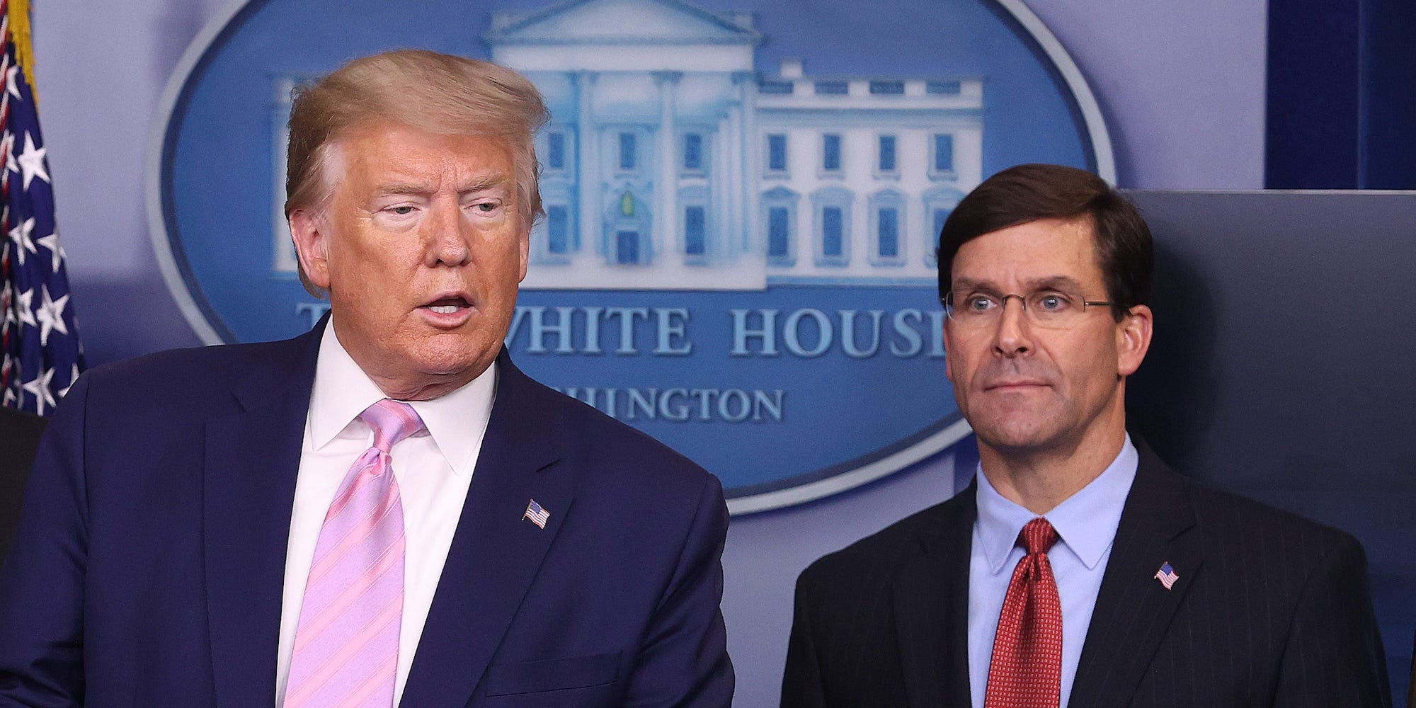 Former President Donald Trump speaks at the press briefing room as former Defense Secretary Mark Esper looks on at the White House on April 1, 2020.