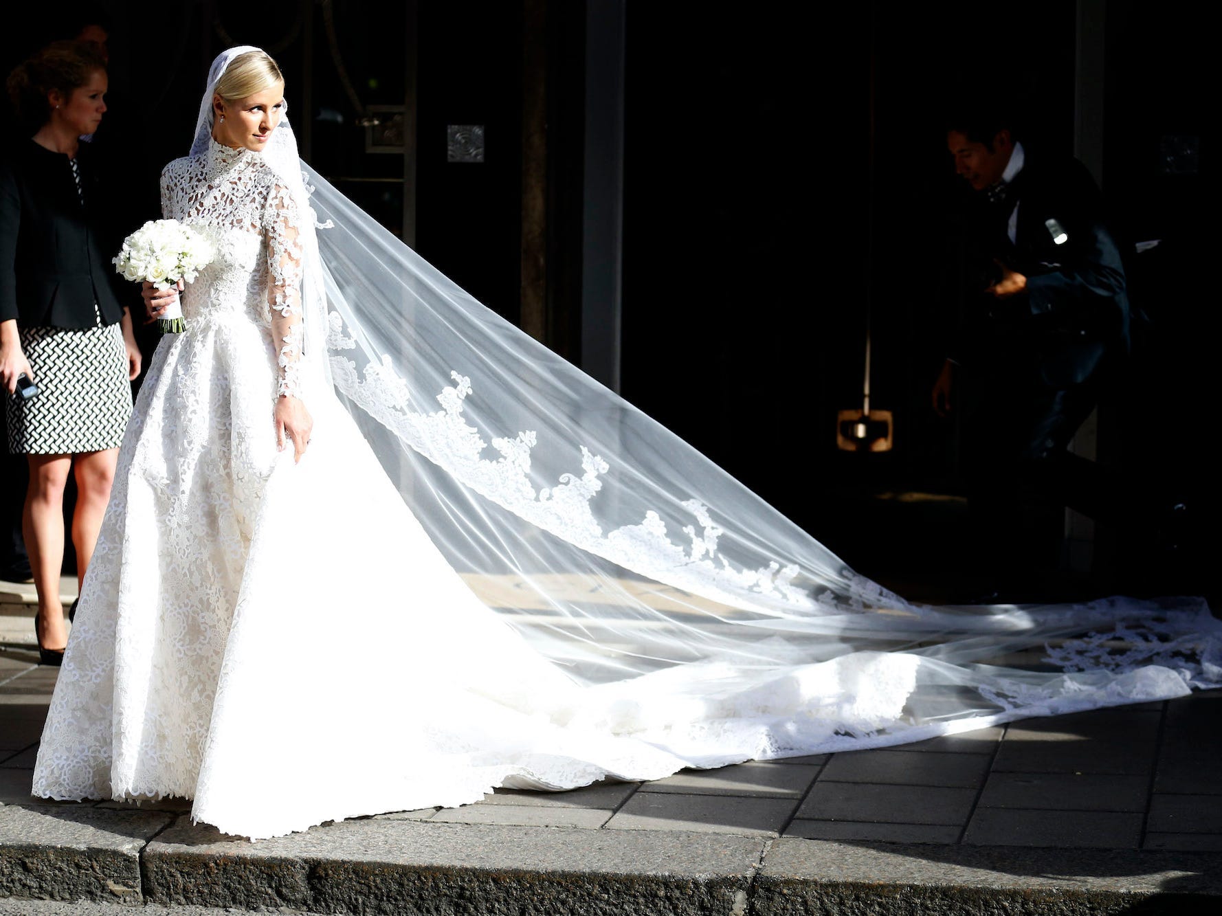 Nikki Hilton walks in her wedding dress.