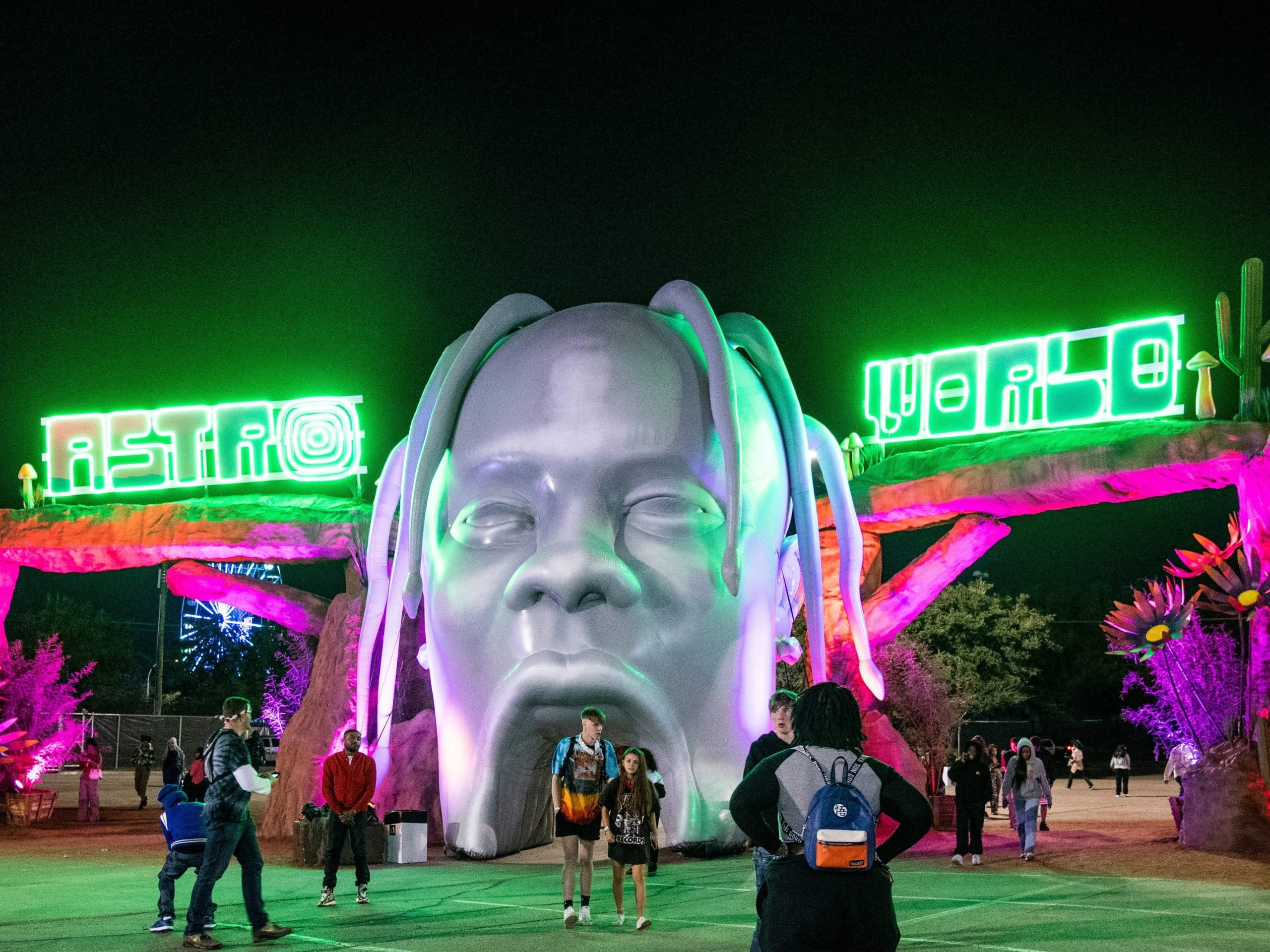 Festival goers are seen exiting NRG Park on day one of the Astroworld Music Festival on Friday, Nov. 5, 2021, in Houston.