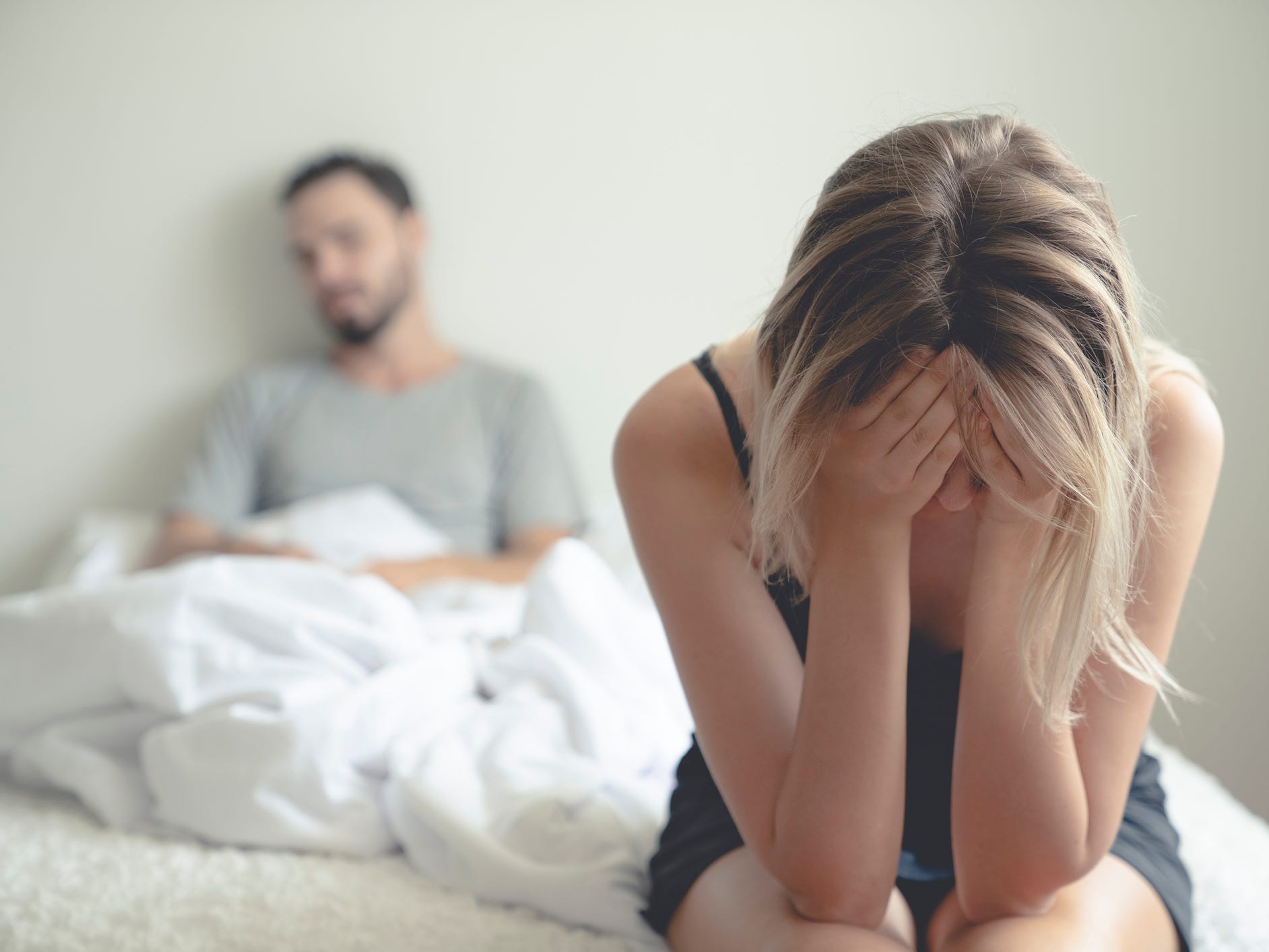 Couple upset in bed