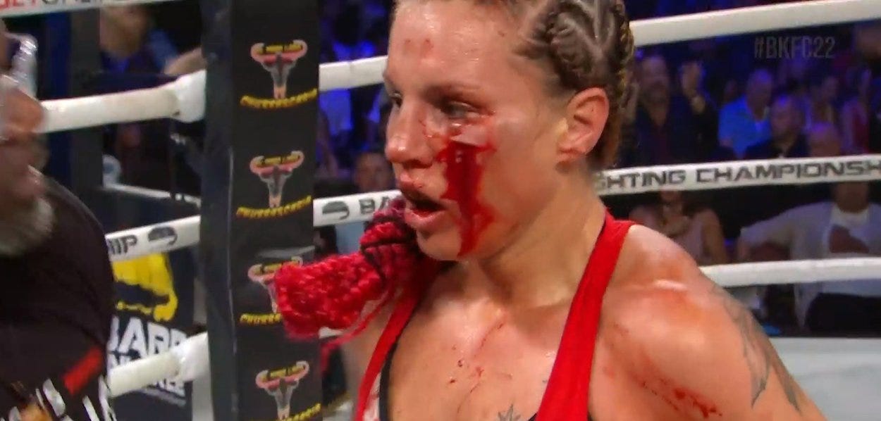 Britain Hart overcame a mask of blood to triumph in a hotly-contested war with Pearl Gonzalez.