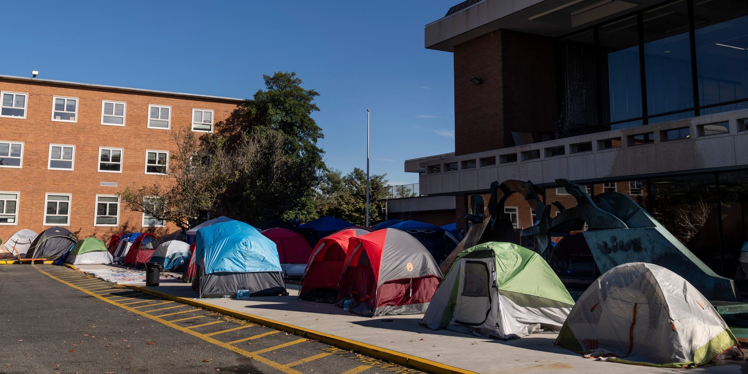 Tents stationed outside of Howard University student center entrance.