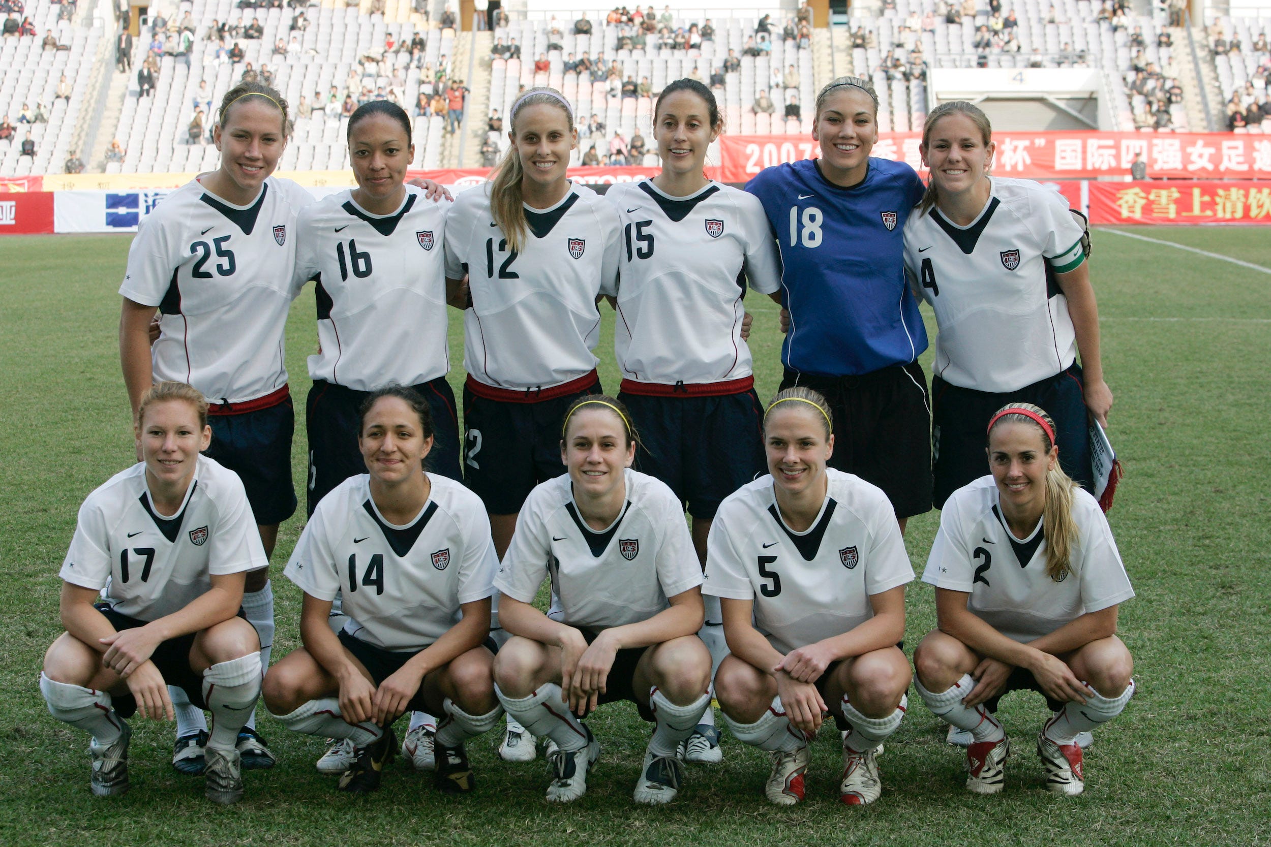Hucles and Osborne (second and third from the left in the top row) suit up for the USWNT in 2007.