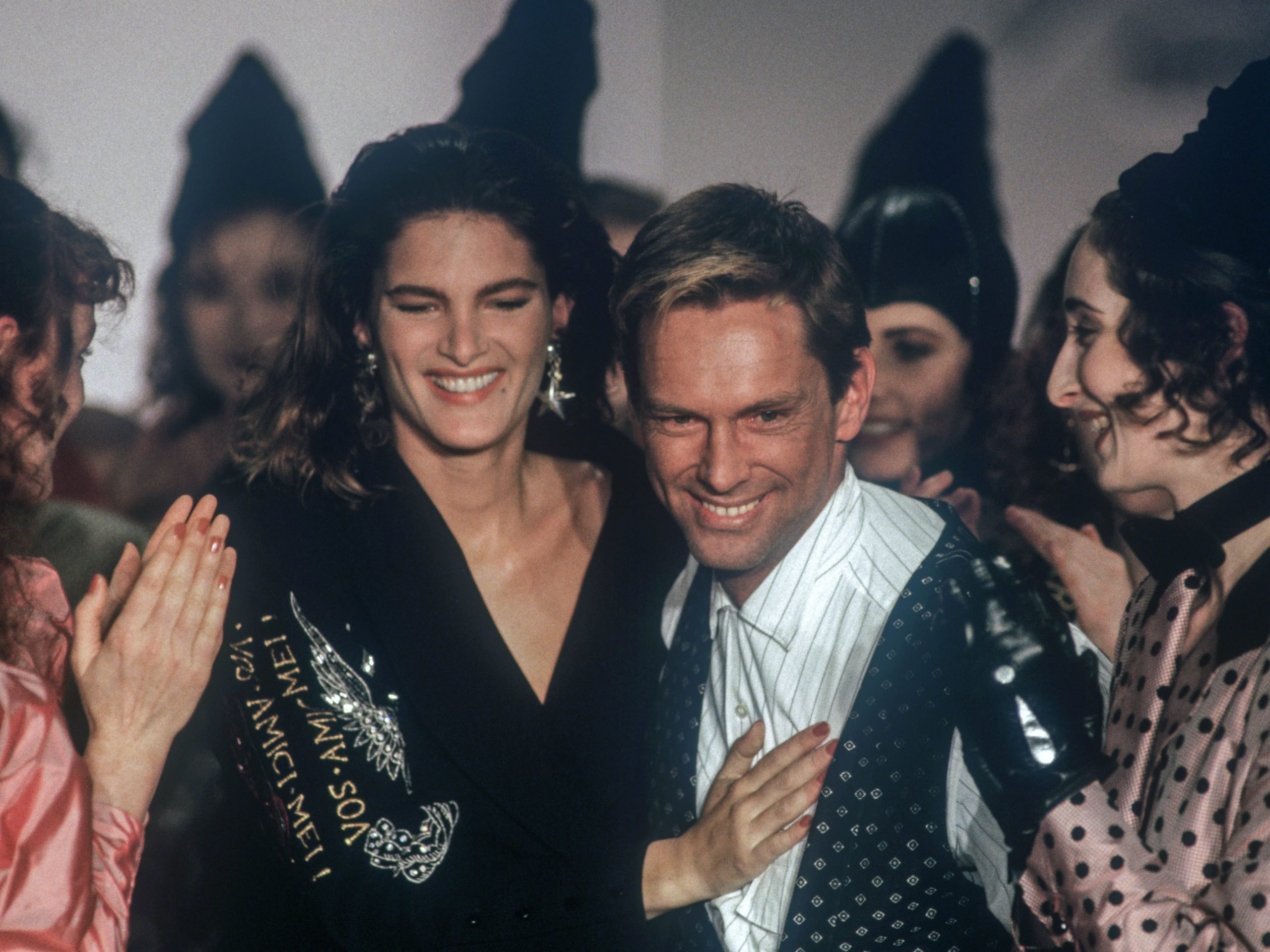 Fashion designer Wolfgang Joop in March 1987 surrounded by models. He was born on 18 November 1944 in Potsdam.