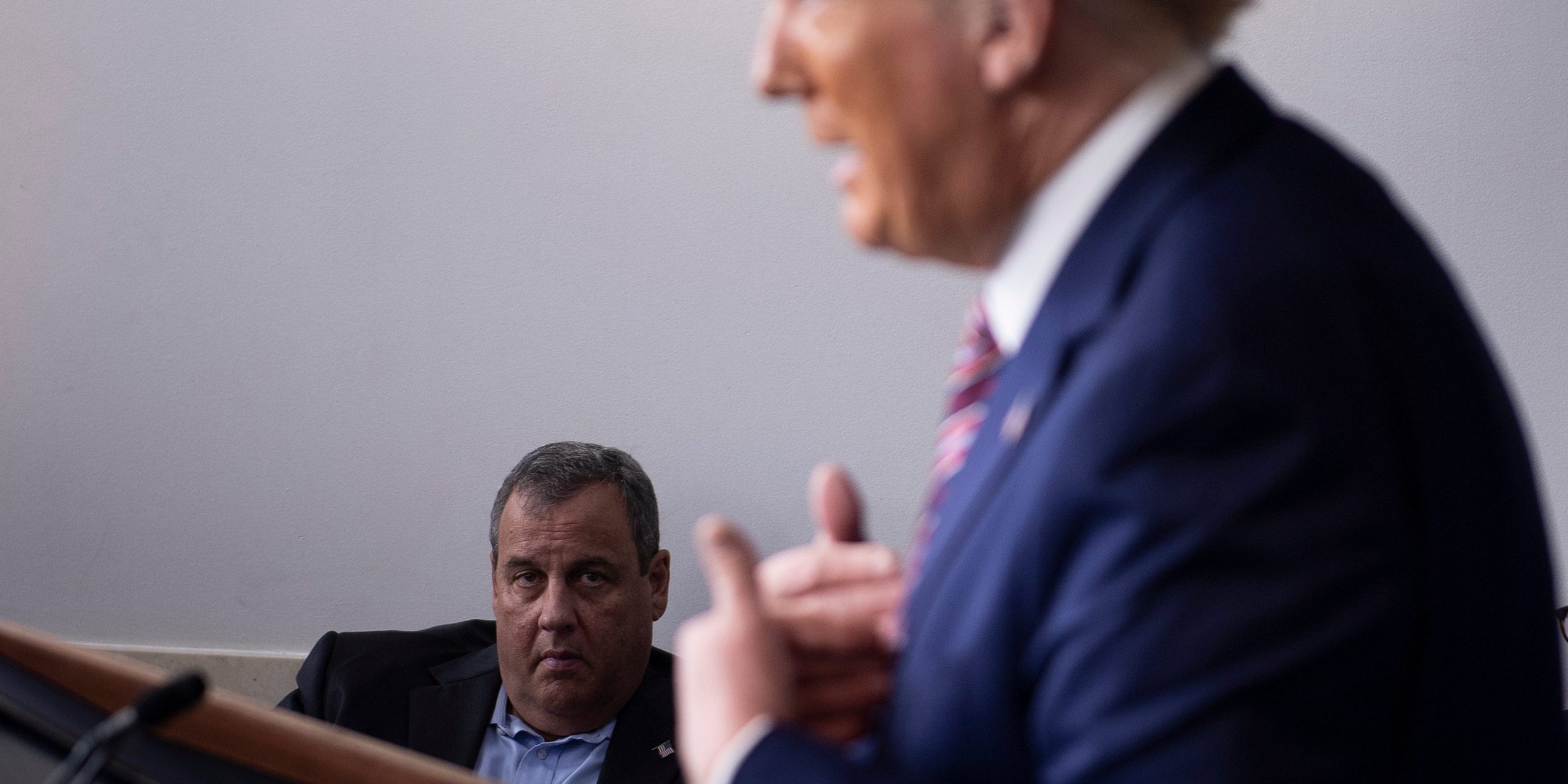 ￼Former New Jersey Governor Chris Christie looks on as former President Donald Trump speaks during a briefing at the White House on September 27, 2020.